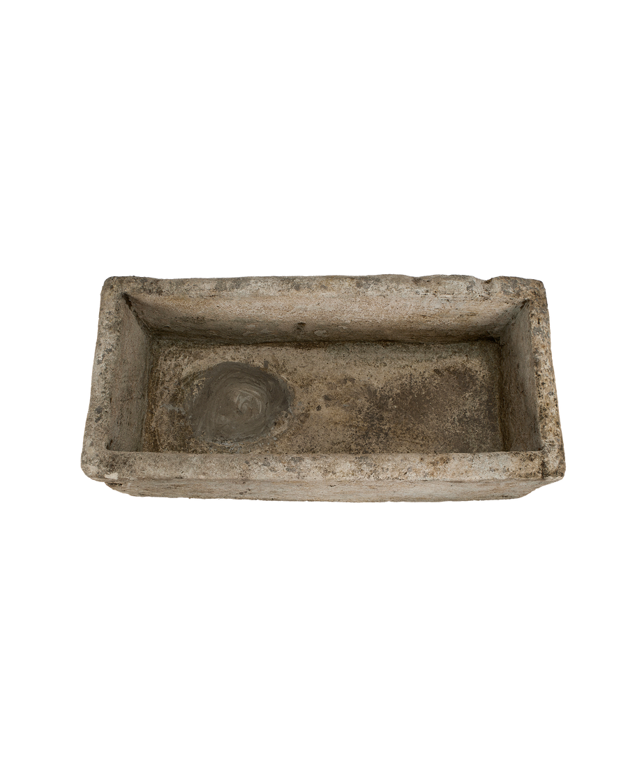 Vintage Indonesian rectangular limestone trough, top-down view showing interior basin, textured condition.