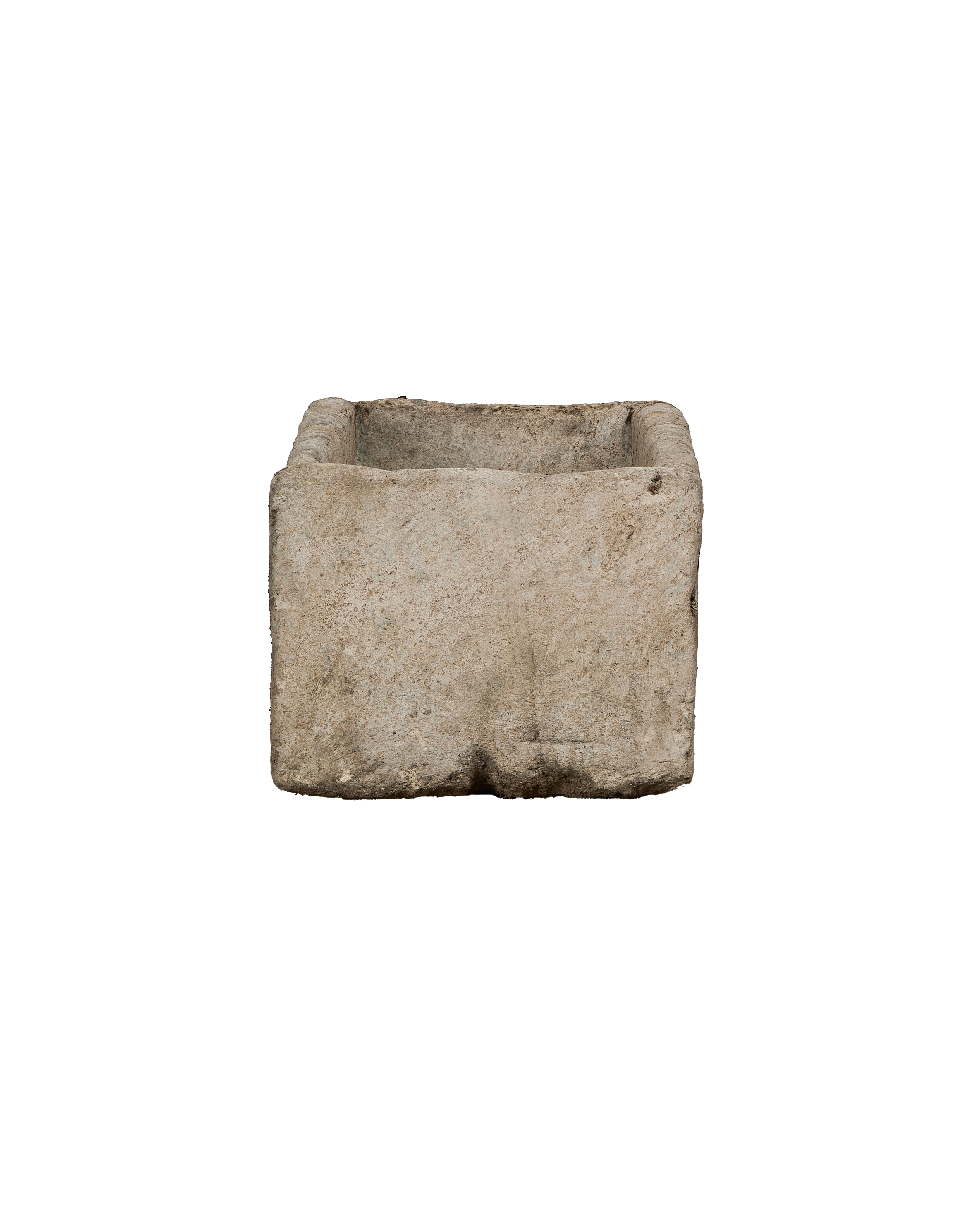 Vintage limestone trough from Indonesia, weathered with a rustic, textured side view.
