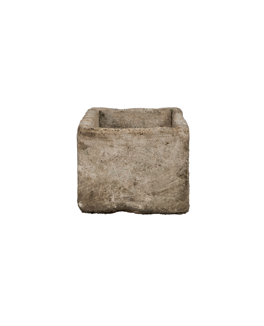Vintage limestone rectangular trough, close-up of textured walls showing natural weathering, Indonesia.