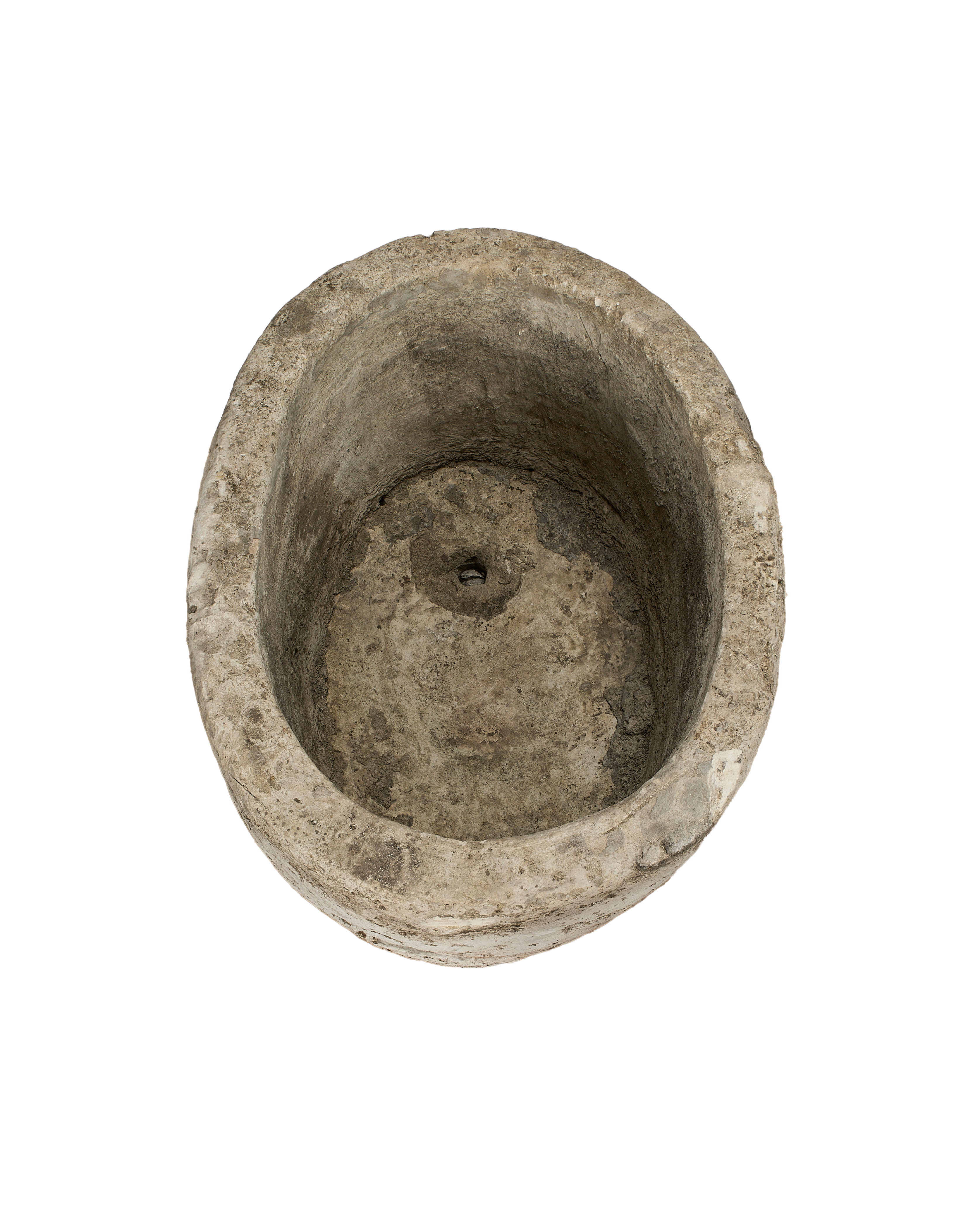 Vintage Indonesian oblong limestone trough, inside close-up, showing weathered interior and drain hole.
