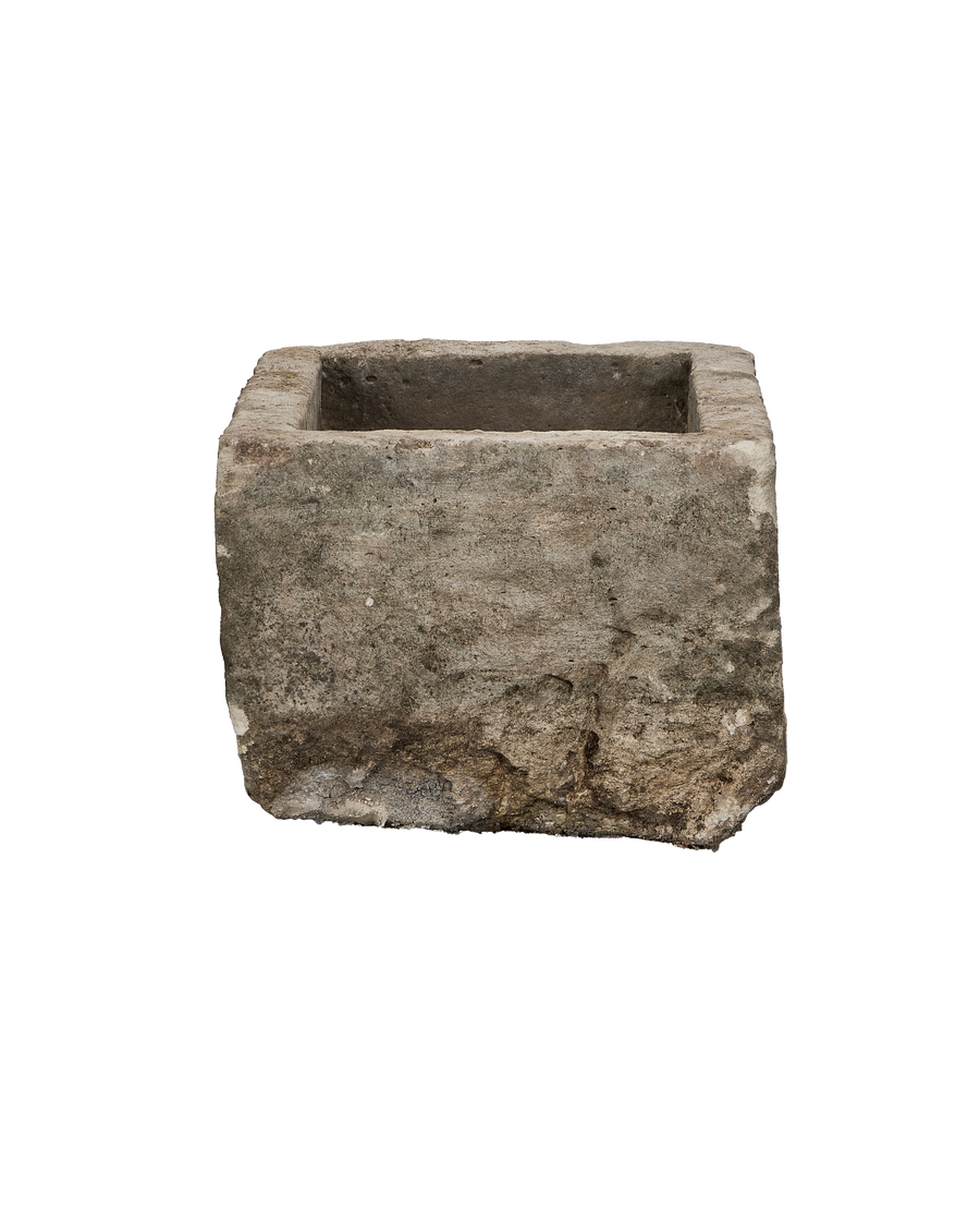 Vintage Indonesian rectangular limestone trough, front and side view, showing weathered surface.
