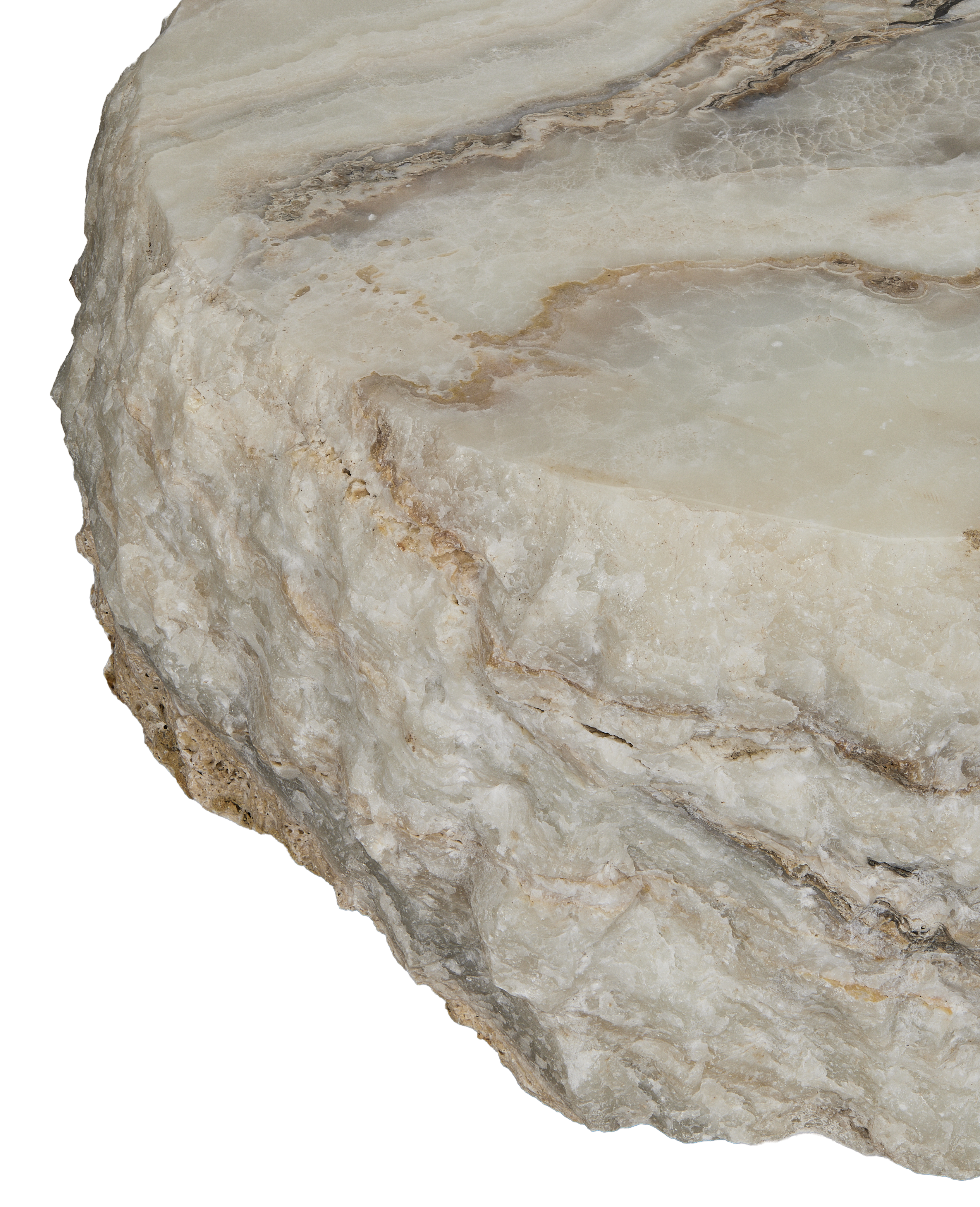 Raw edge of onyx slab, showcasing detailed natural texture and veining.