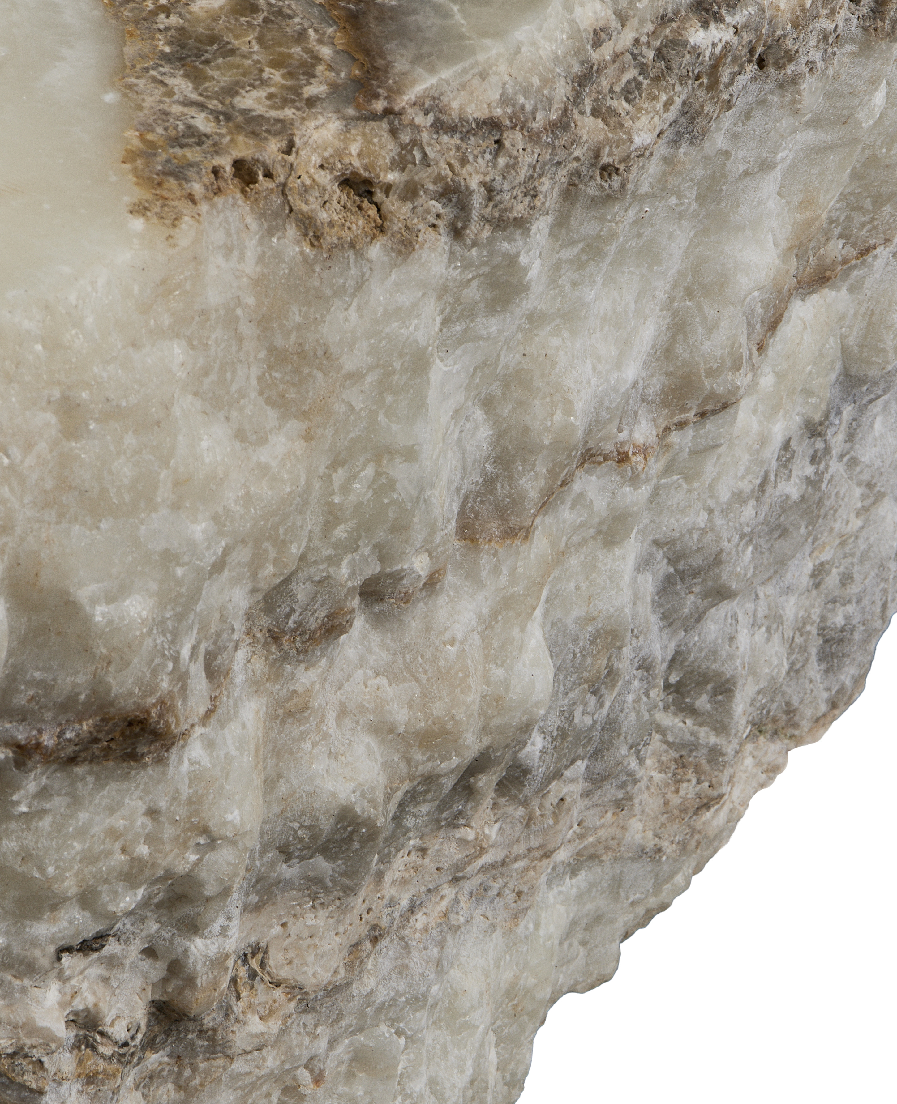 Close-up of the vintage Indonesian onyx slab's rough, natural edge texture.
