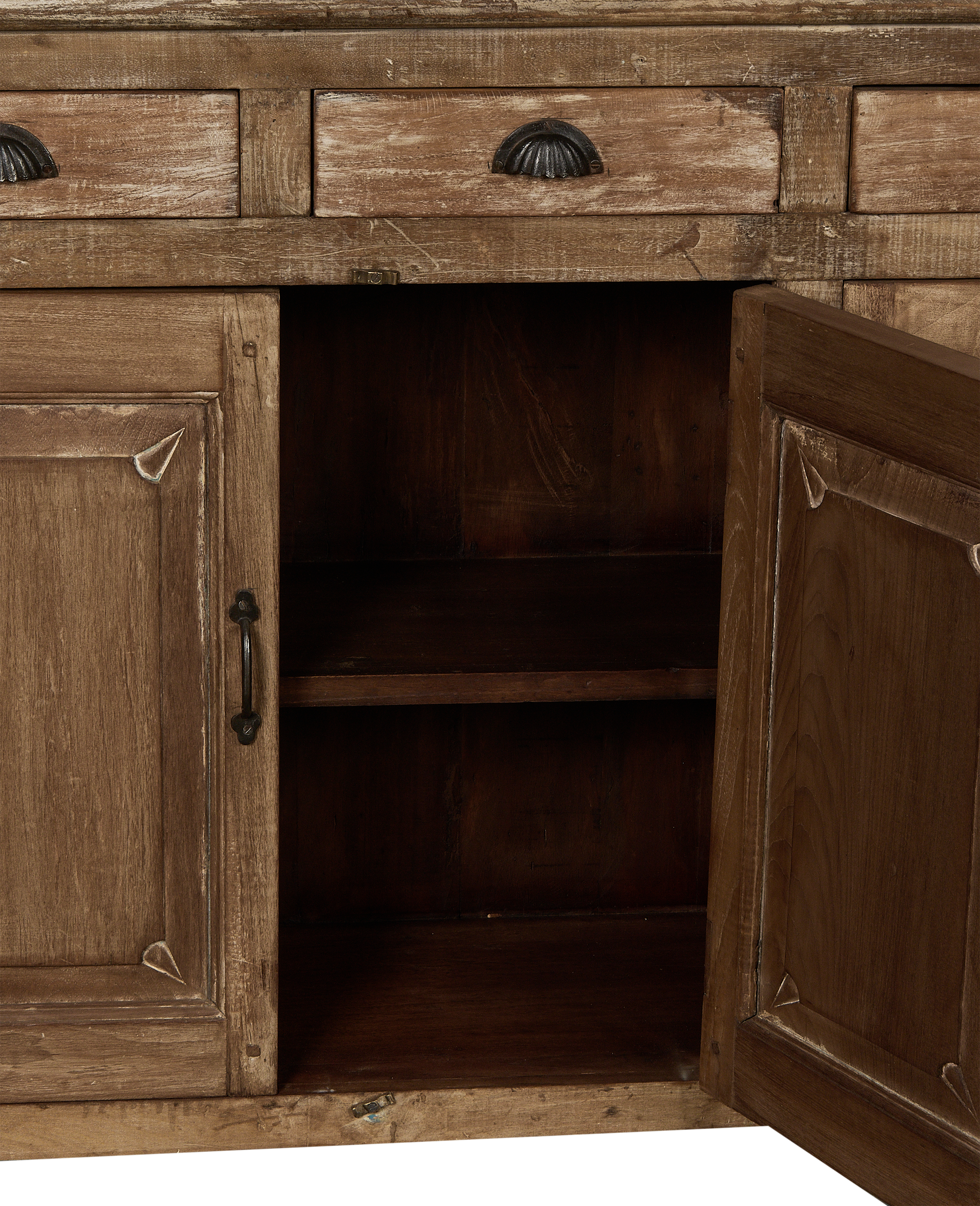 Vintage Indian oak cabinet, right door ajar, showing internal shelves and distressed natural wood finish.