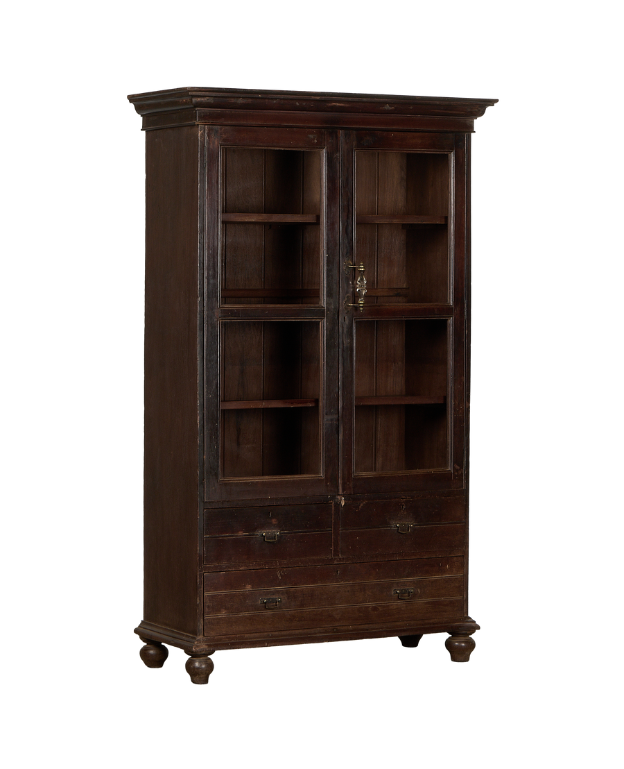 Vintage Indian oak wood display cabinet, glass doors, brass hardware, and lower drawers.
