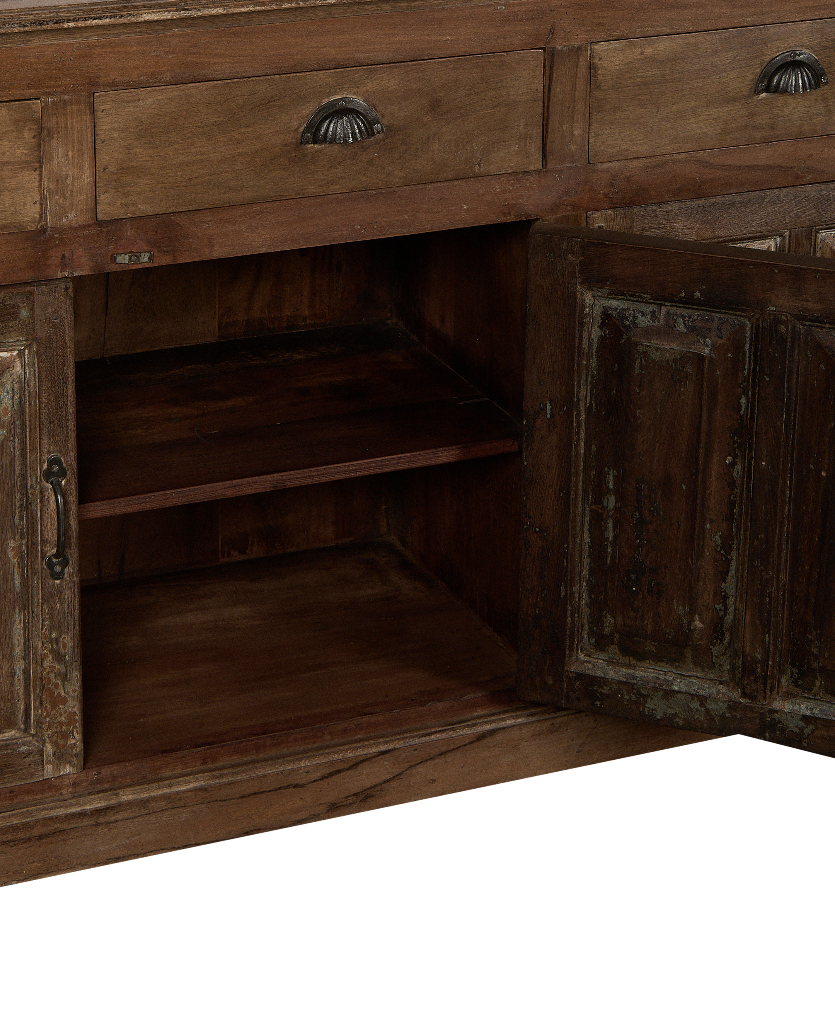 Opened vintage Indian oak cabinet showing natural wood interior shelves and distressed texture.