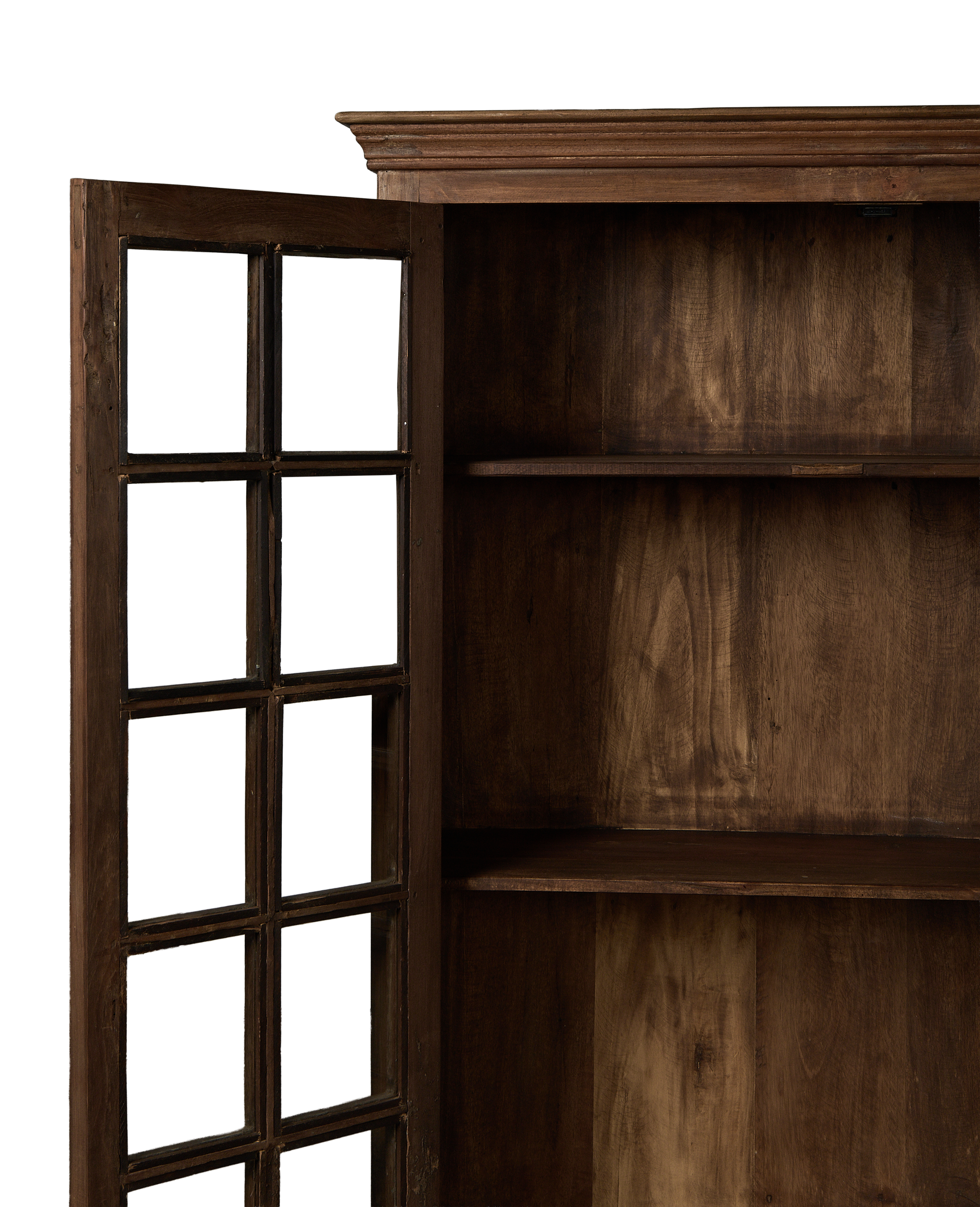 Open vintage Indian oak cabinet door and interior shelves, showcasing natural wood grain.