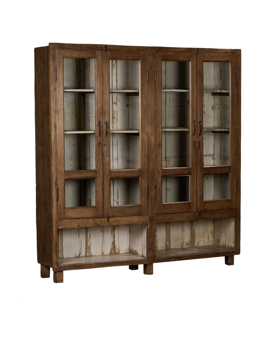 Vintage Indian oak cabinet showing distressed white painted interior and glass display doors.