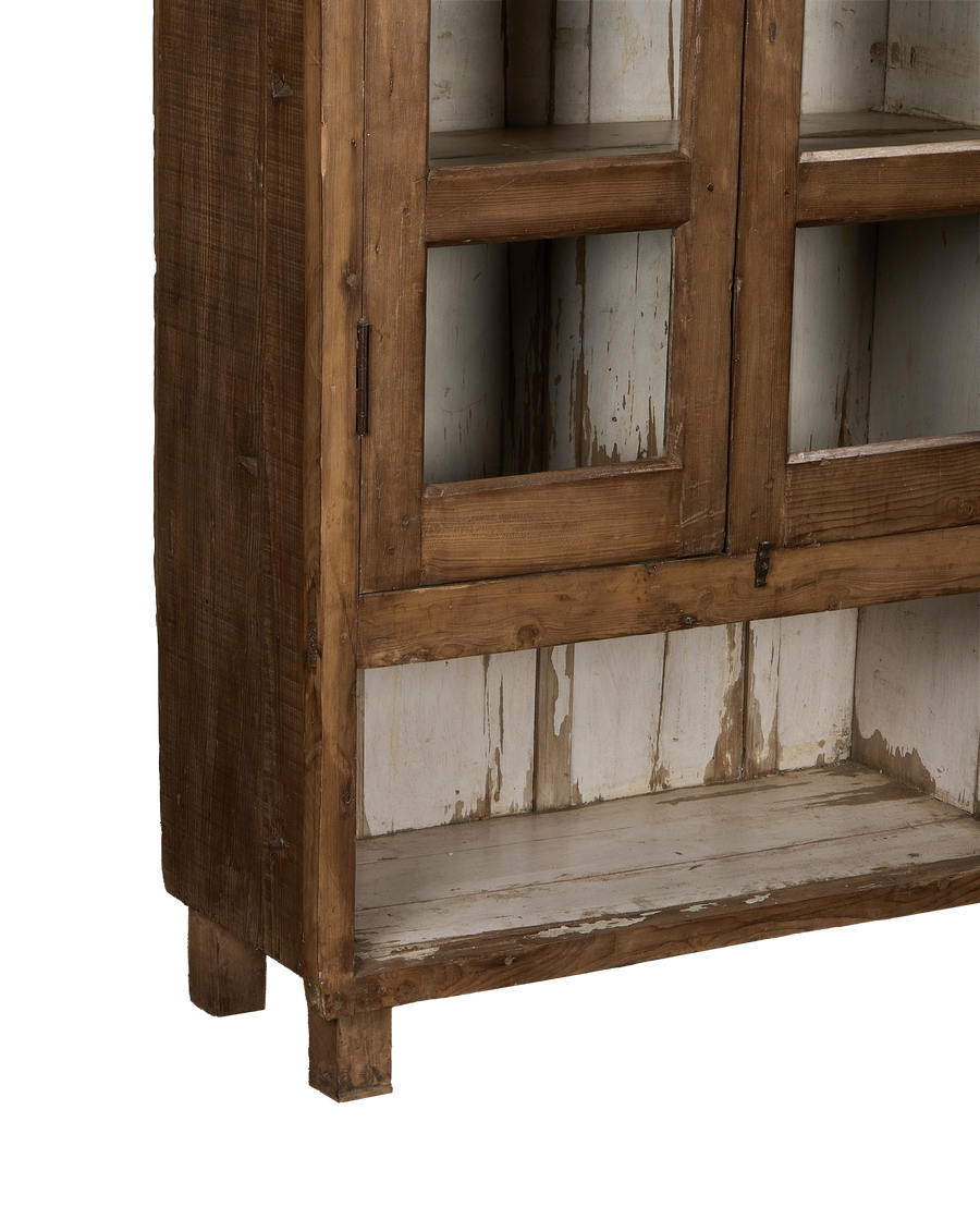 Vintage Indian oak cabinet: lower section with wood feet and distressed white interior.