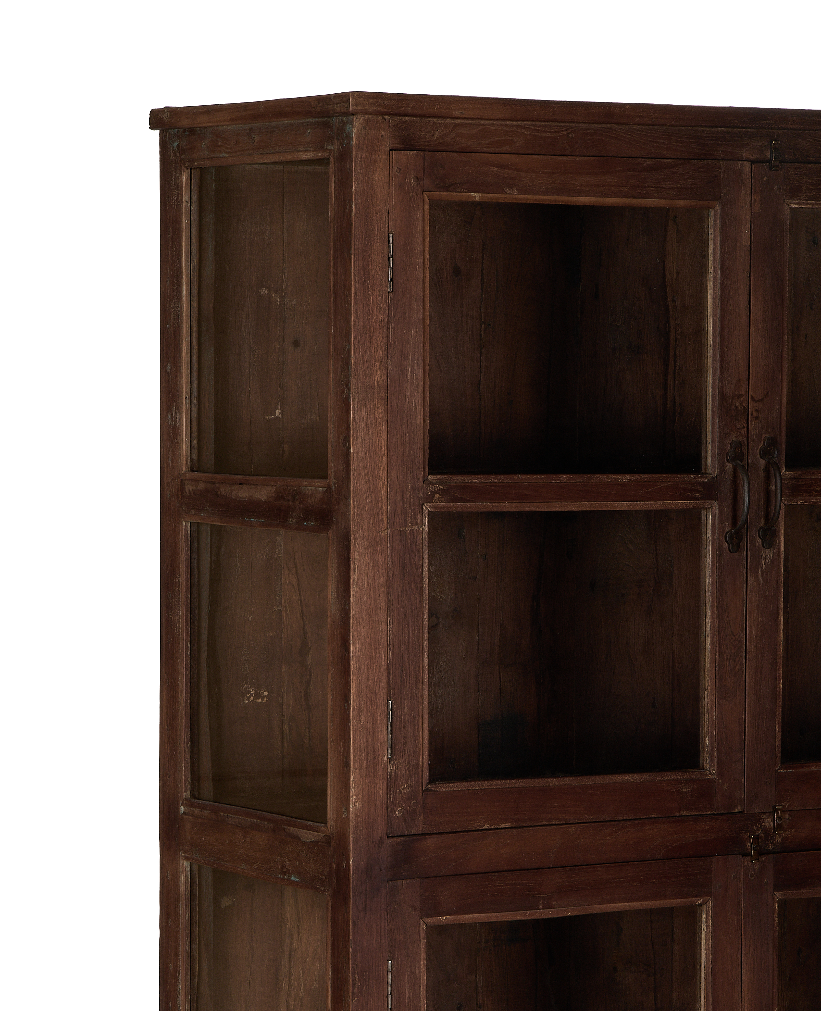 Vintage Indian oak wood cabinet, close-up of glass paneled door and natural distressed finish.