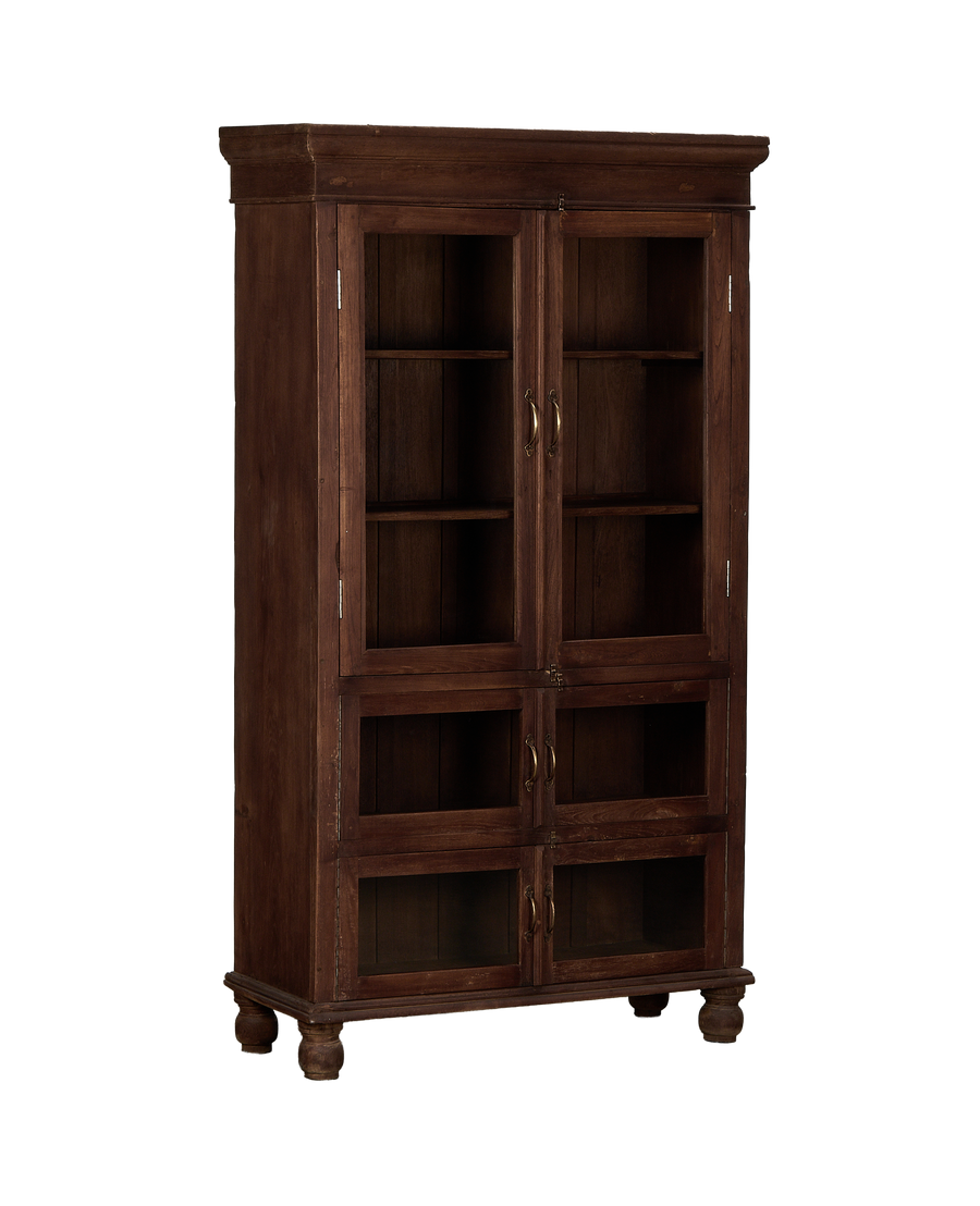 Vintage Indian bleached oak wood cabinet, frontal view detailing dark glass doors and brass pulls.