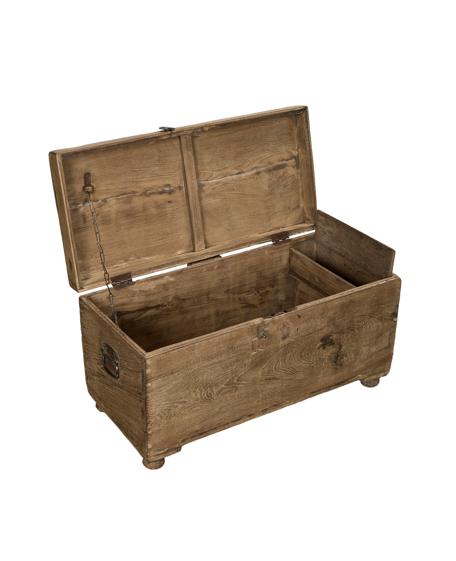 Opened vintage oak wood chest from India, showcasing distressed natural interior, chain, and hinges.