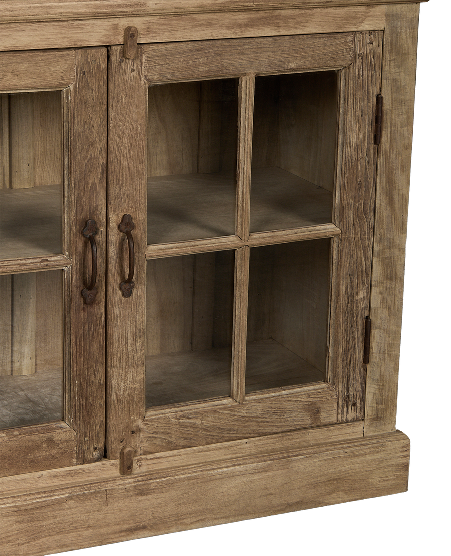 Vintage bleached oak cabinet with glass-paned doors and distressed bronze hardware.
