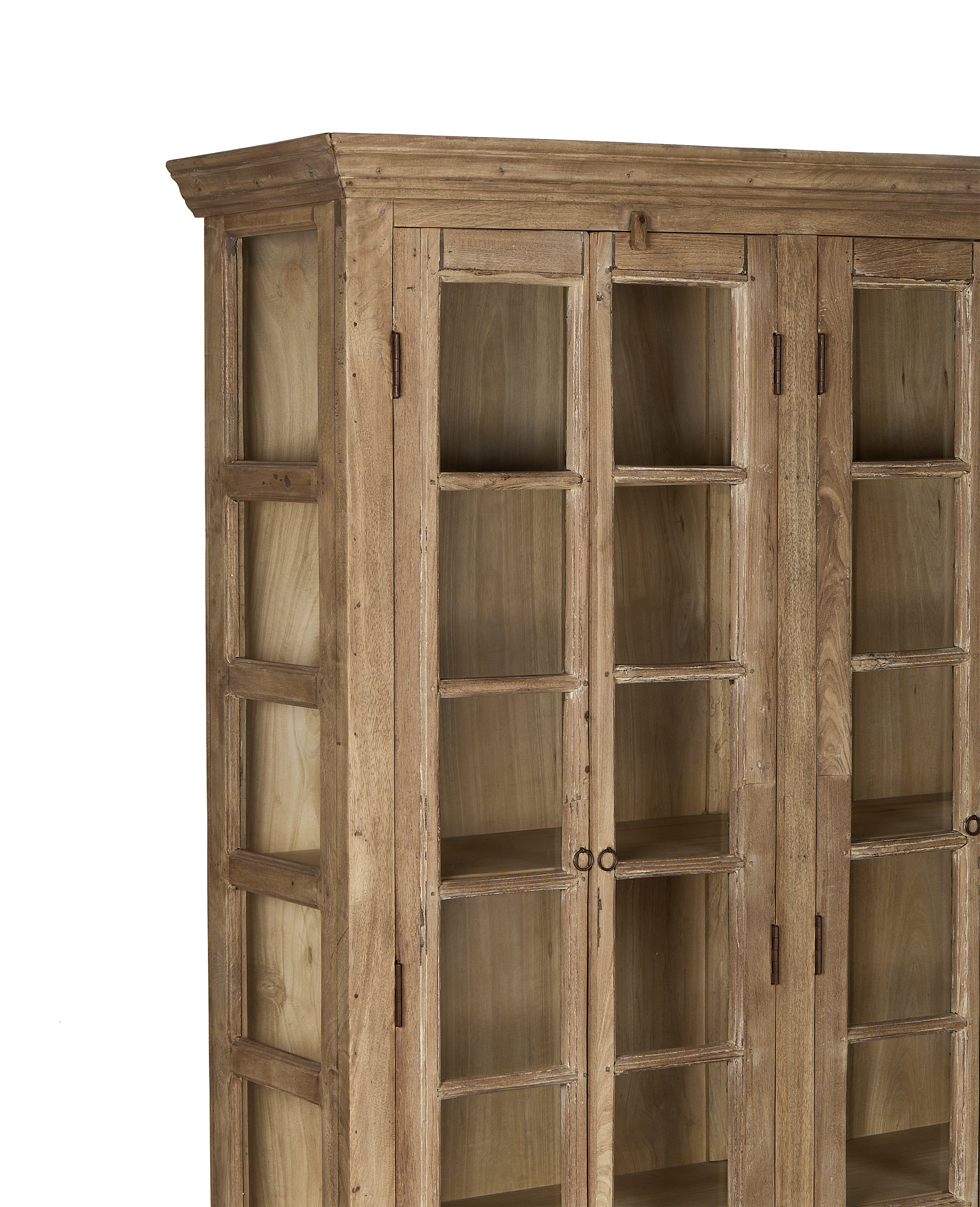 Vintage bleached oak wood cabinet with glass-paned doors and distressed Indian craftsmanship.