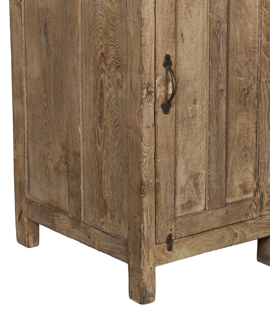 Vintage bleached oak cabinet from India, showing weathered wood texture and aged bronze handle.