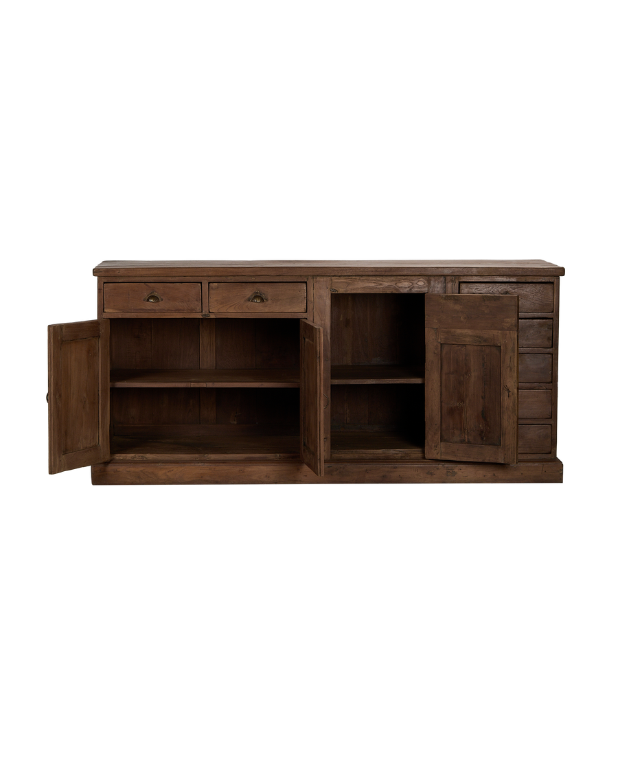 Vintage Indian oak sideboard showcases open doors, drawers, and brass pulls for natural texture.