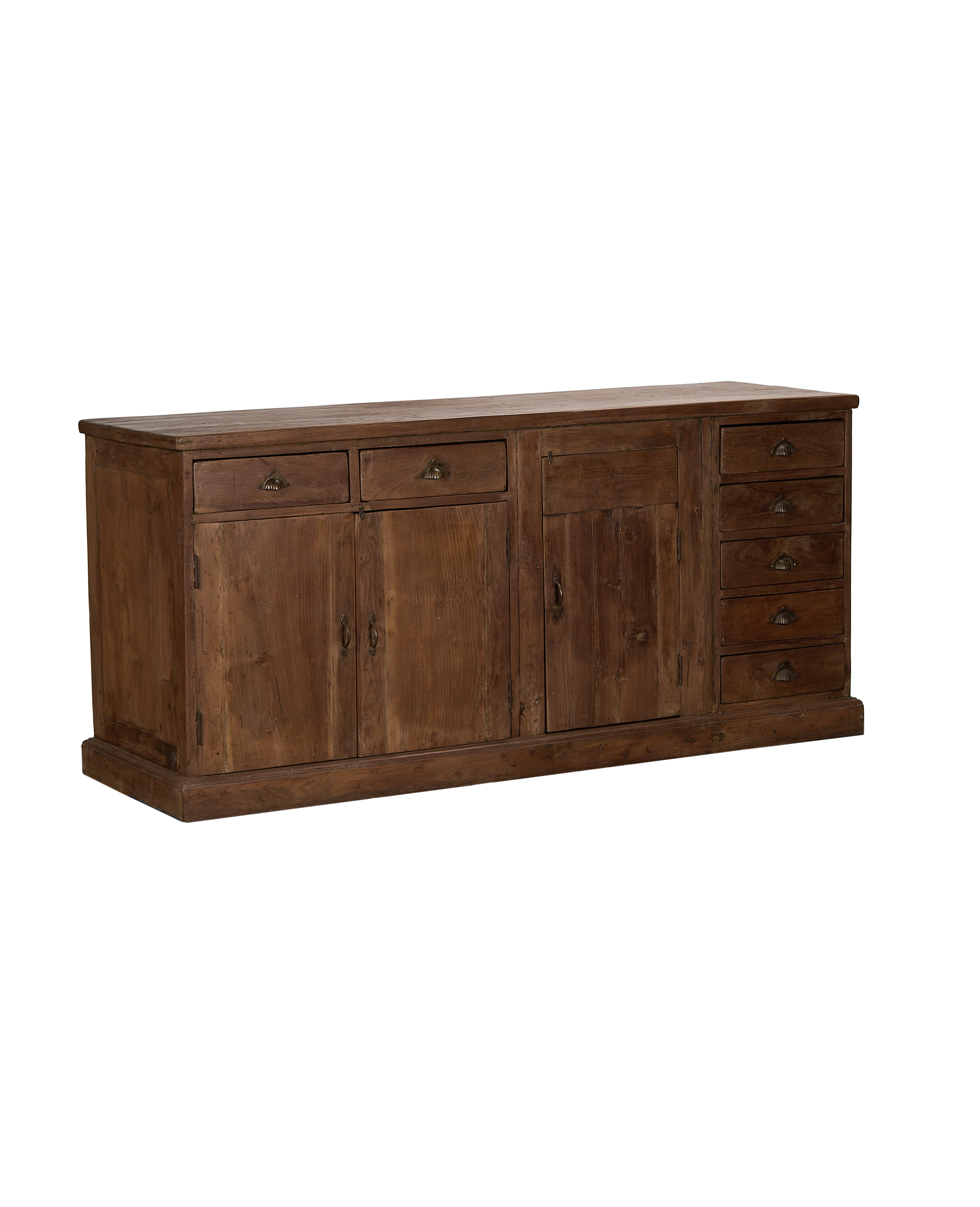 Vintage Indian oak sideboard, angled view showing varied drawers and cabinet doors.