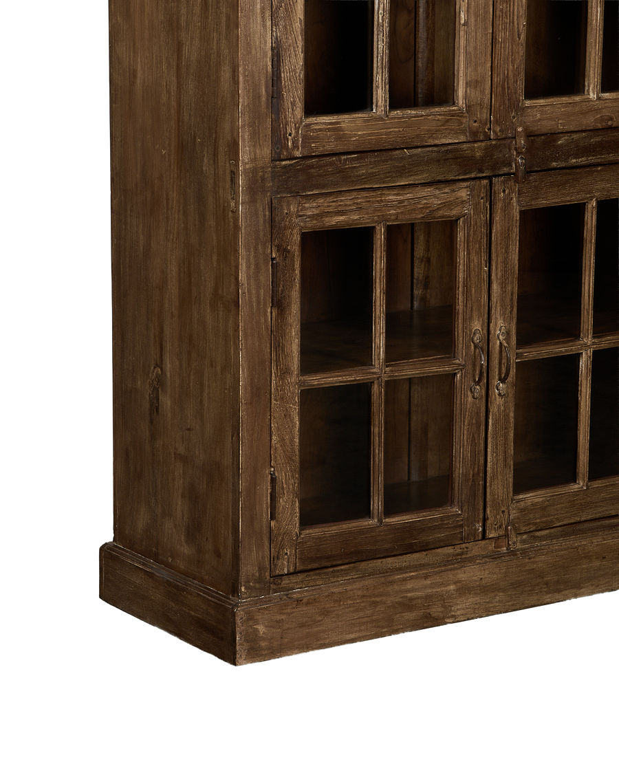 Vintage oak India wood cabinet, bleached finish, showing glass doors and distressed texture detail.