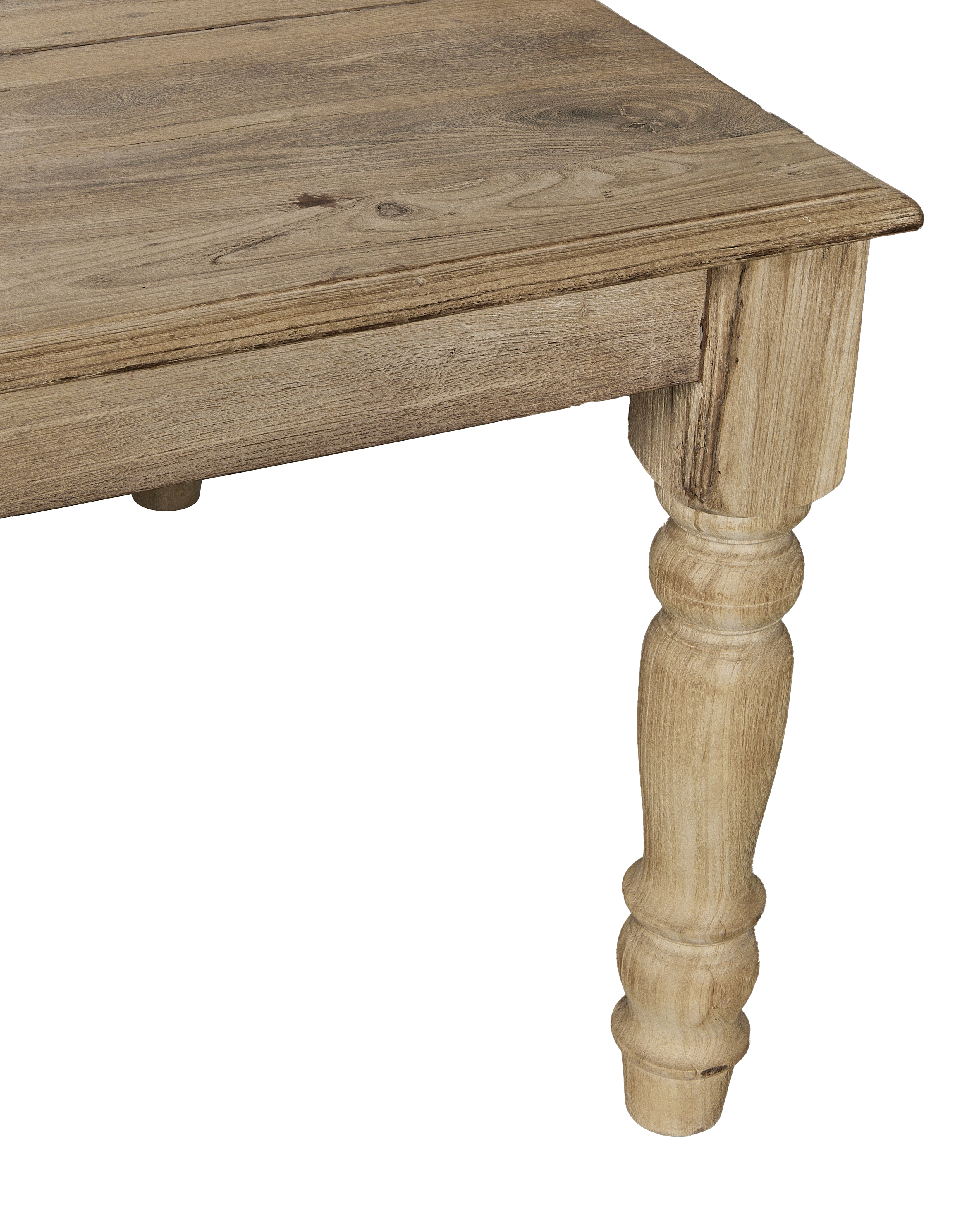 Bleached vintage Indian oak wood table, close-up of beautifully turned leg and apron.