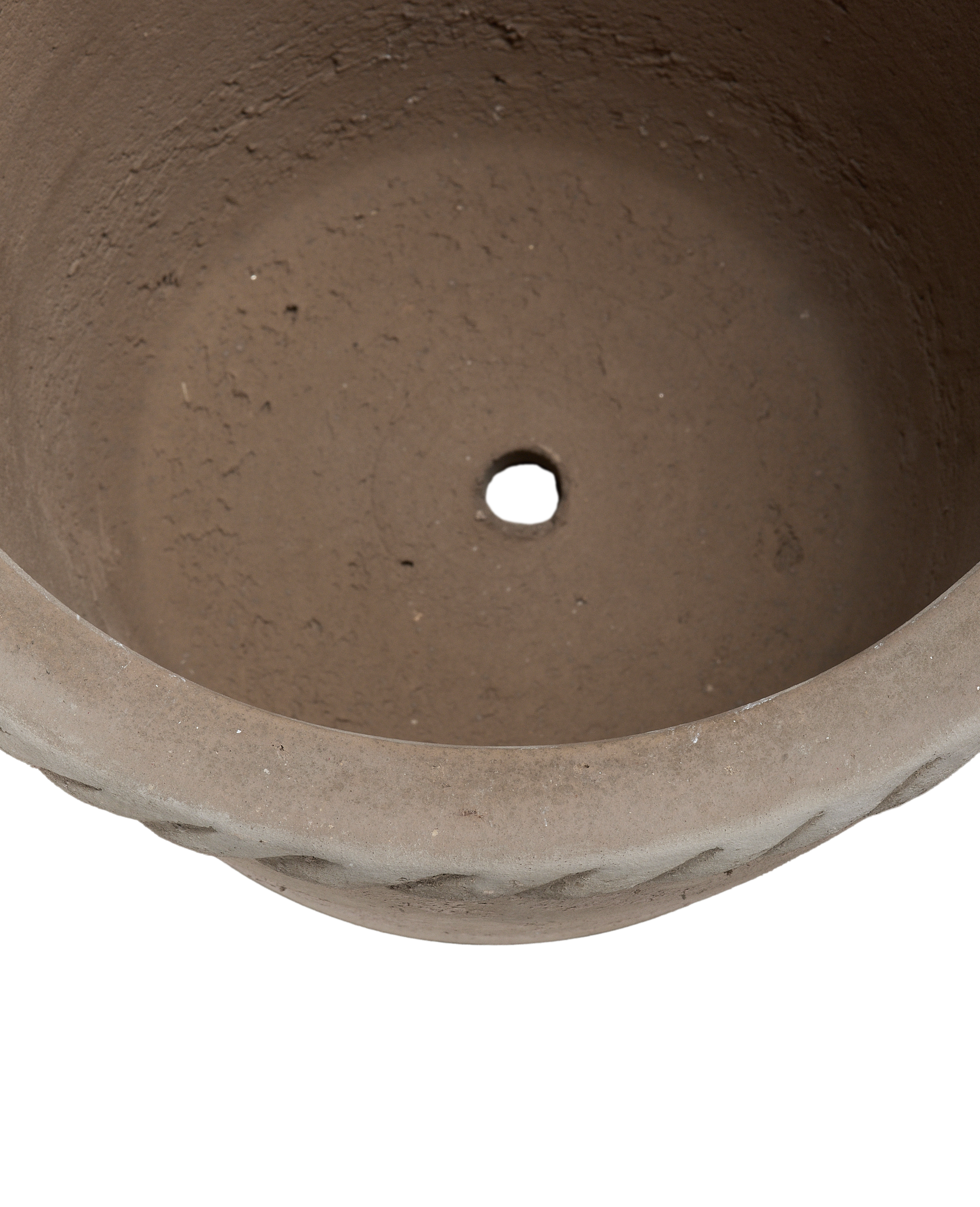 Top-down view of Vietnamese ceramic Entwine Pot interior with rough texture and drainage hole.