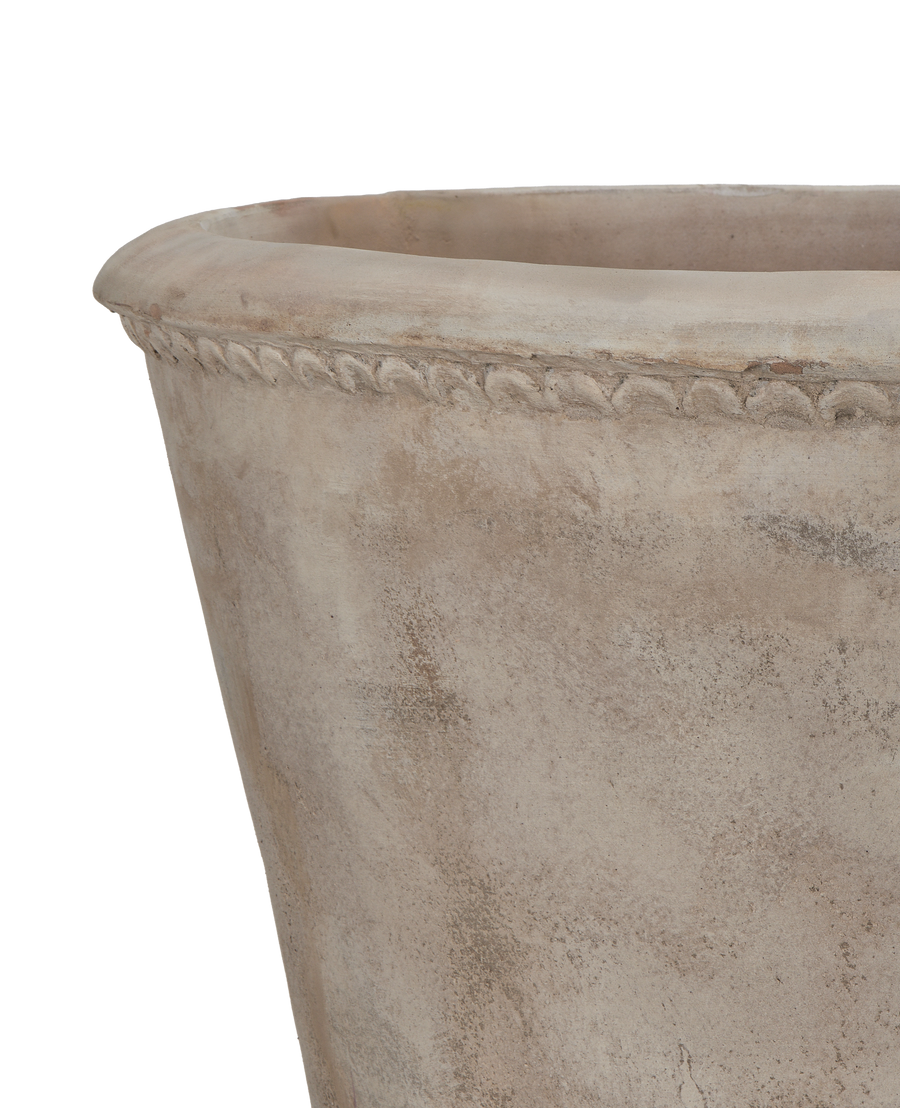 Close-up of matte Vietnamese Arbor pot's ornate rim detail and distressed texture.