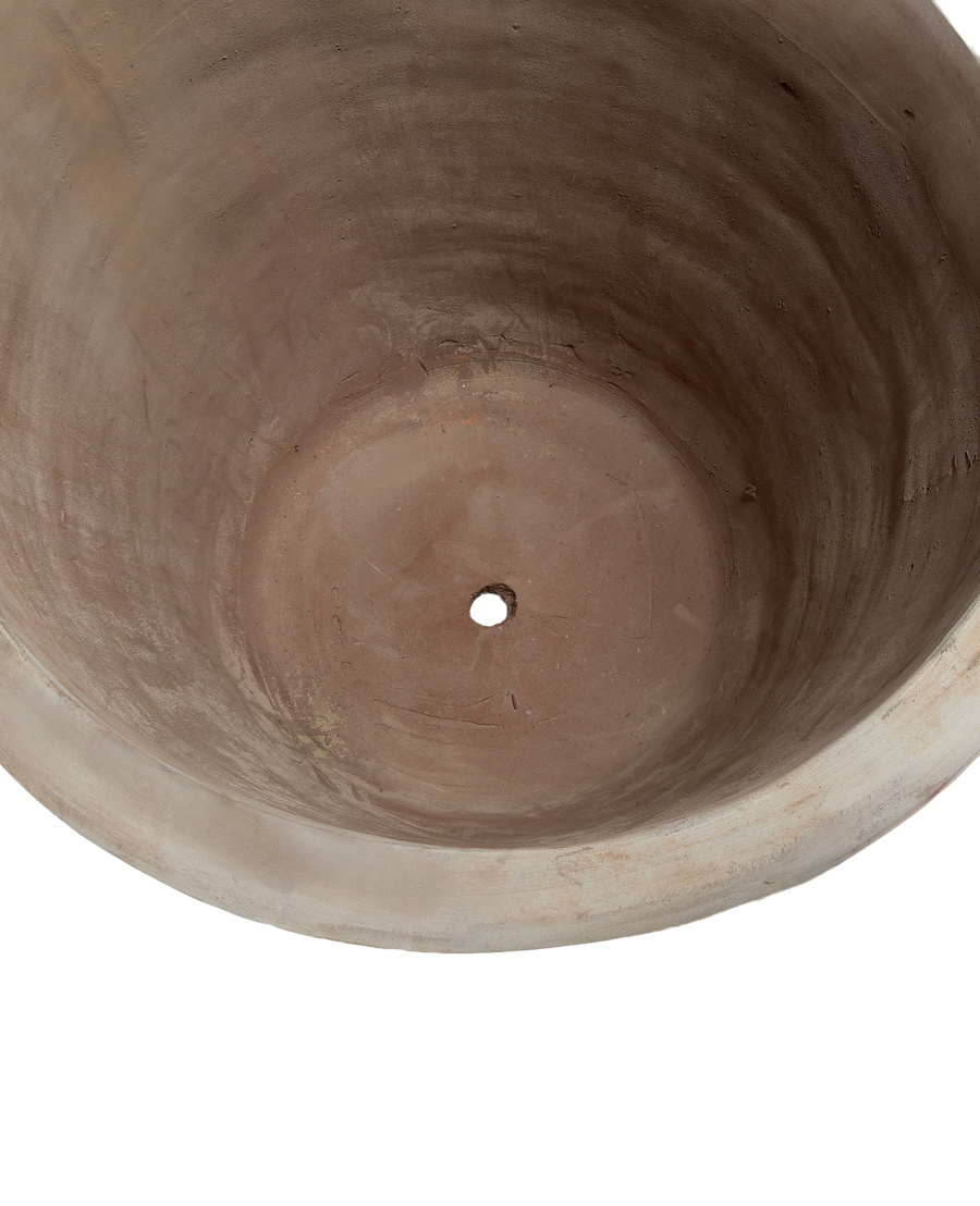 Arbor Pot, Vietnam; view inside showing porous terra cotta texture and drainage hole.