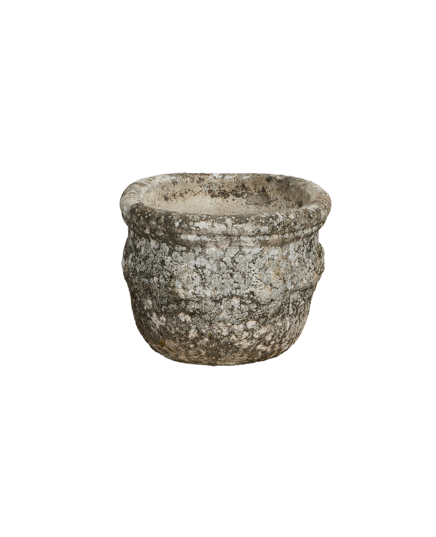 Vintage French concrete oval planter, distressed gray surface with textured details.