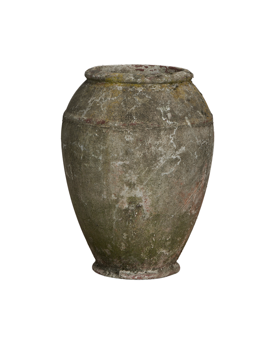 Vintage Willy Guhl planter, close-up of textured concrete with moss and patina.