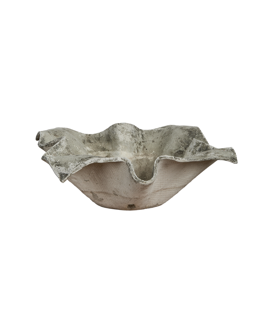 Vintage Willy Guhl Elephant Ear planter showing sculpted form and weathered concrete texture.