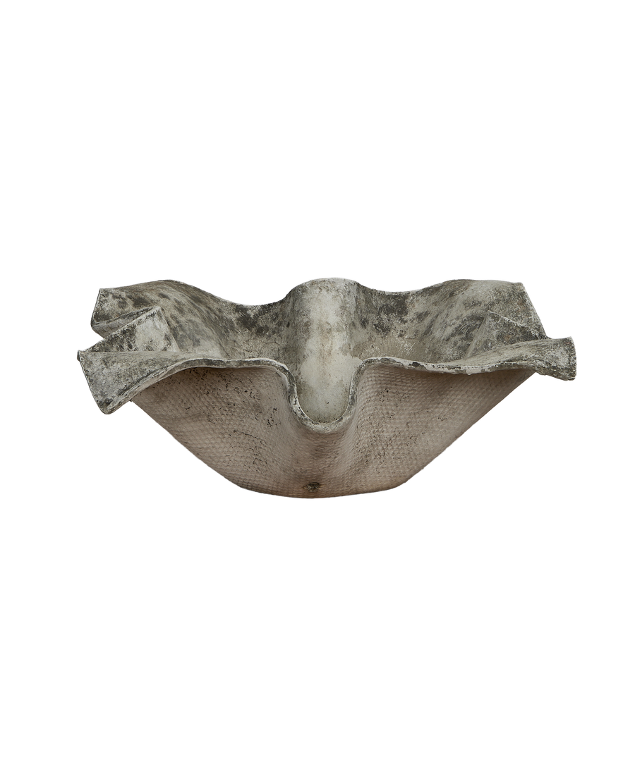 Vintage Willy Guhl elephant ear planter, showcasing weathered gray fiber cement texture.
