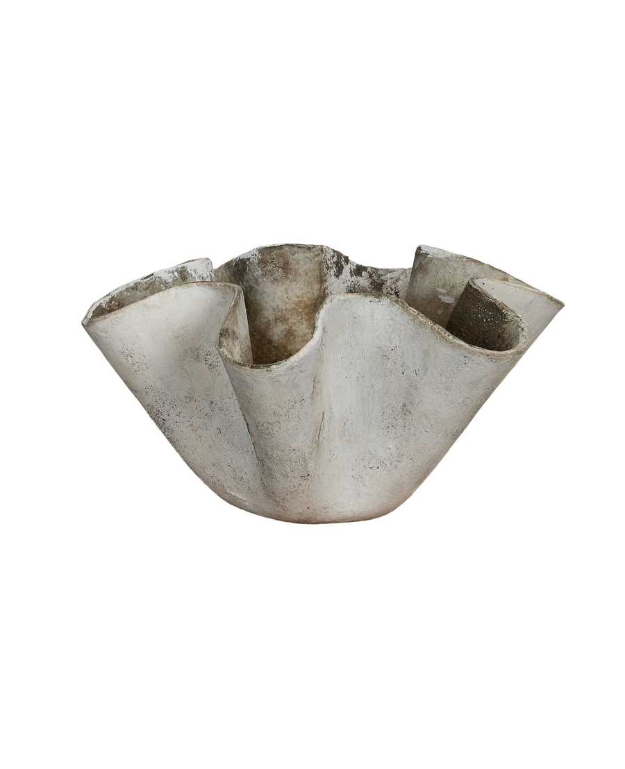 Vintage Willy Guhl concrete planter, organic free-form oval, showcasing rustic weathered texture.