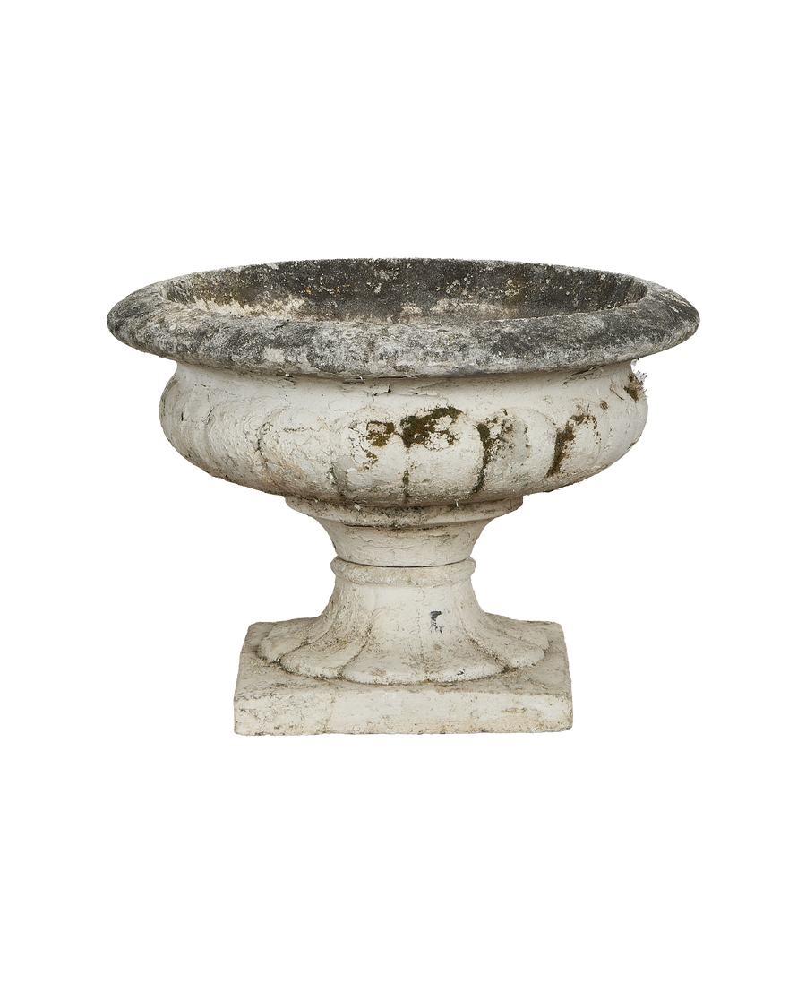 Vintage Medicis Vasque, front partial view, showing chipped paint and mossy texture.