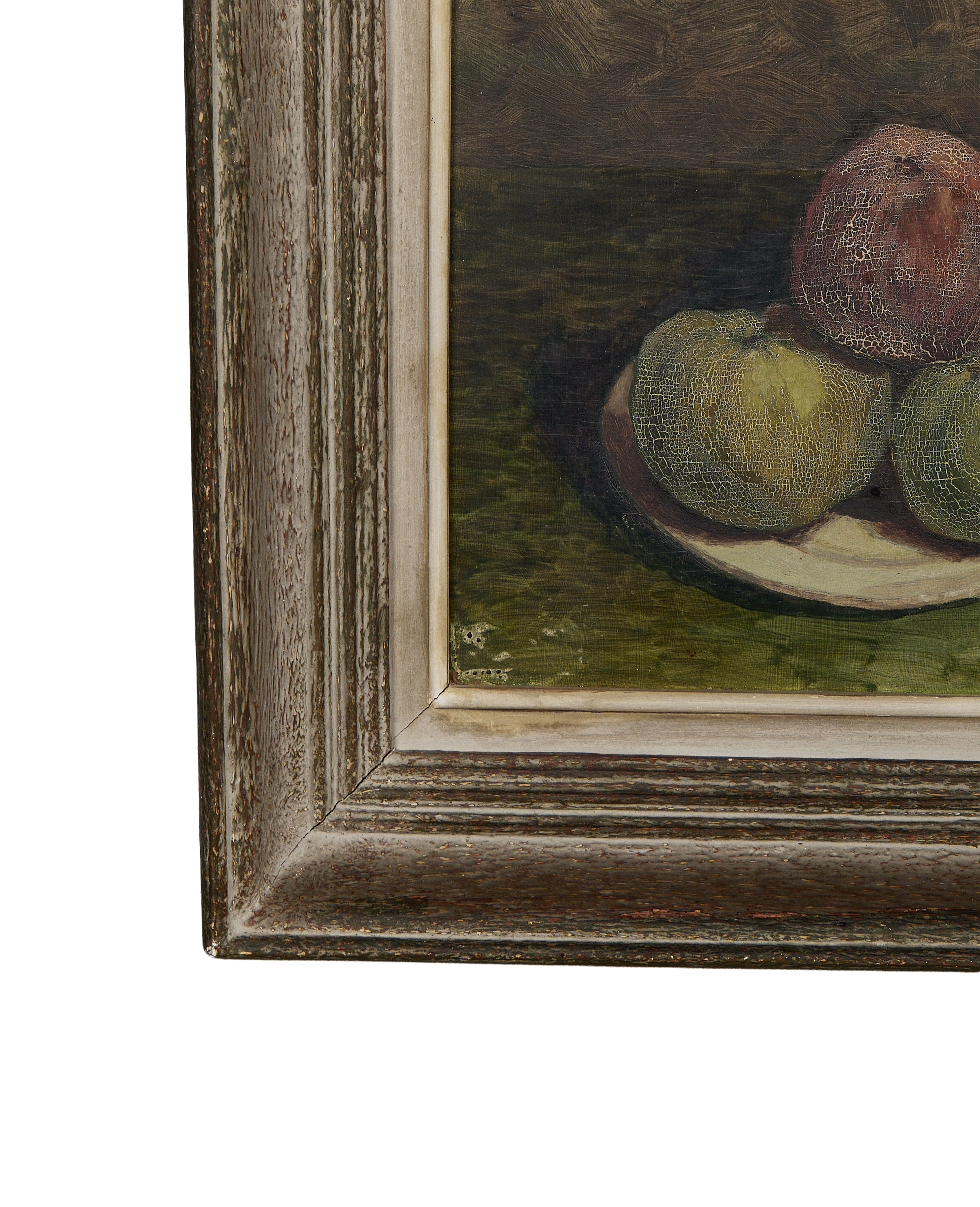 Corner of vintage French oak framed still life painting, showing distressed golden wood.