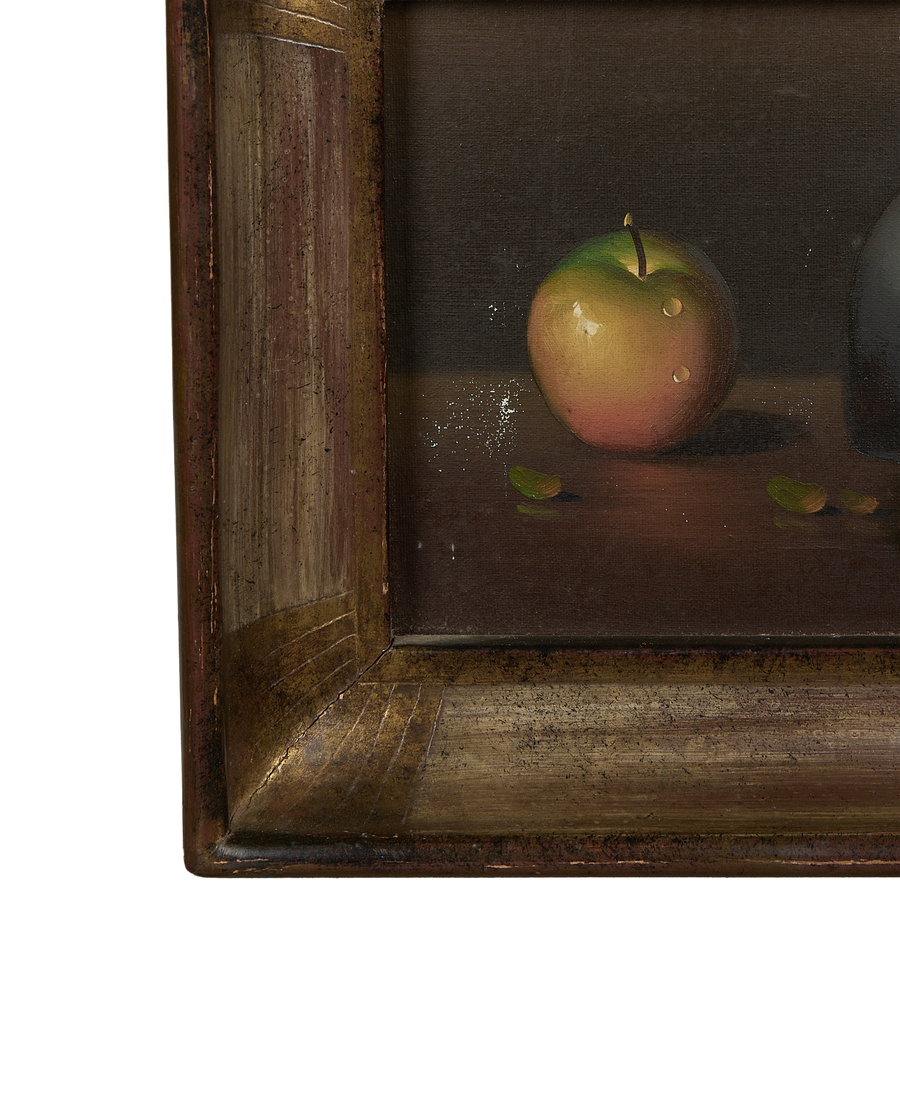 Close-up of vintage French still life painting, showing weathered oak frame and apple detail.