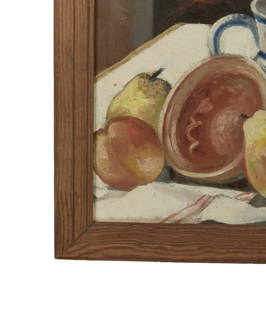 Vintage French still life painting detail showing oak frame corner, fruit, and ceramic bowl.