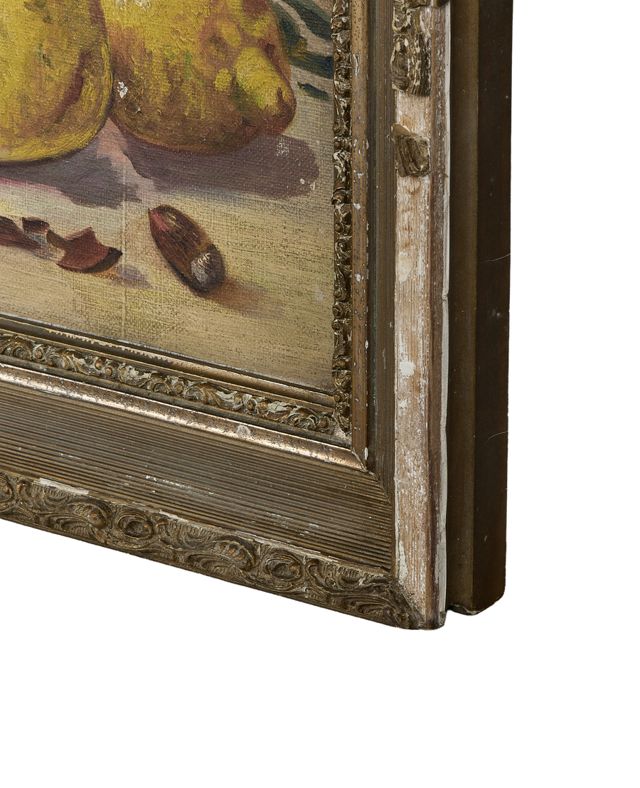 Side view of vintage French oak still life painting frame, showing distressed gilt finish.