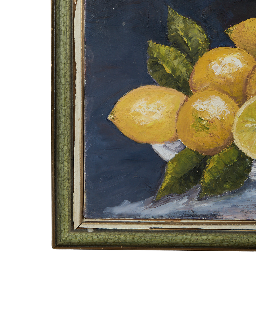 Vintage French still life painting, extreme closeup of detailed lemons and leaves with the distressed oak frame.