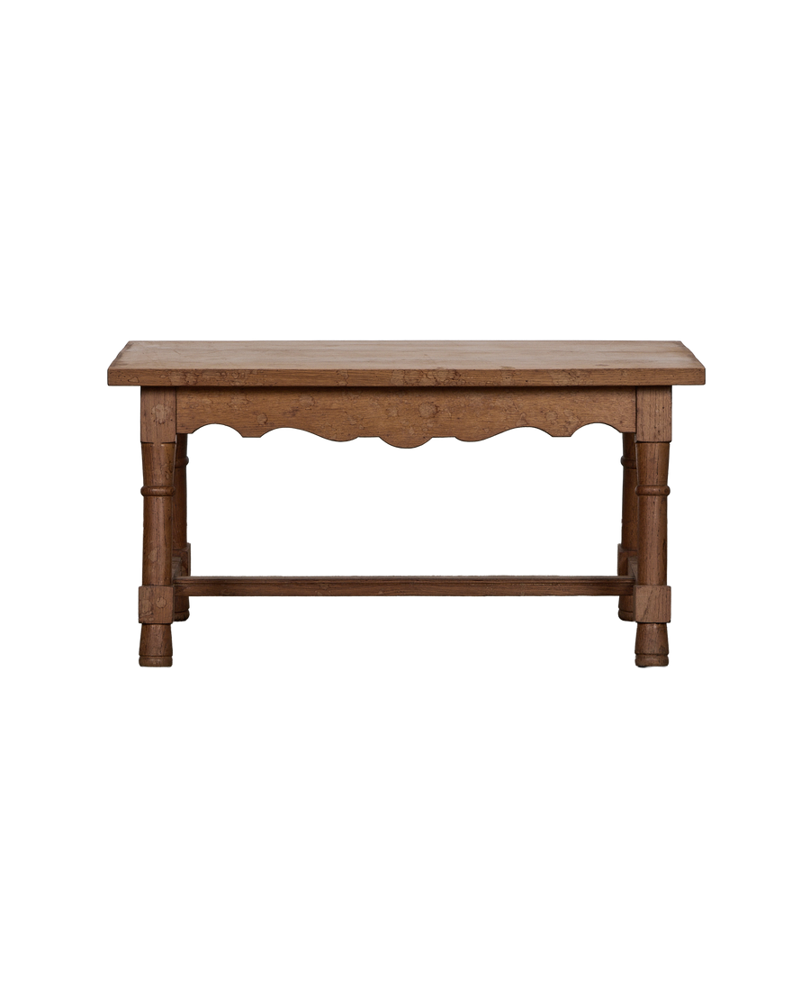 Vintage oak French coffee table, full view of the turned legs and scalloped apron.