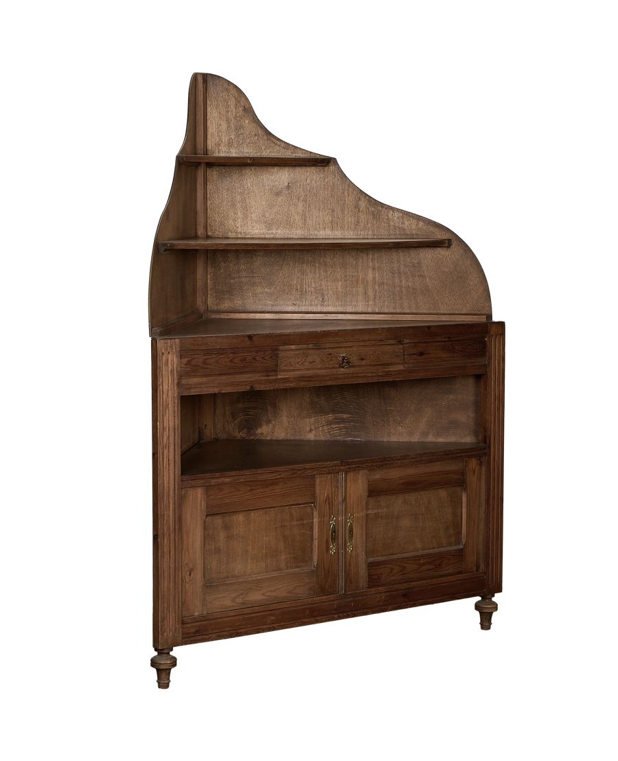 Vintage French oak corner cabinet, full front view displaying carved details and brass hardware.