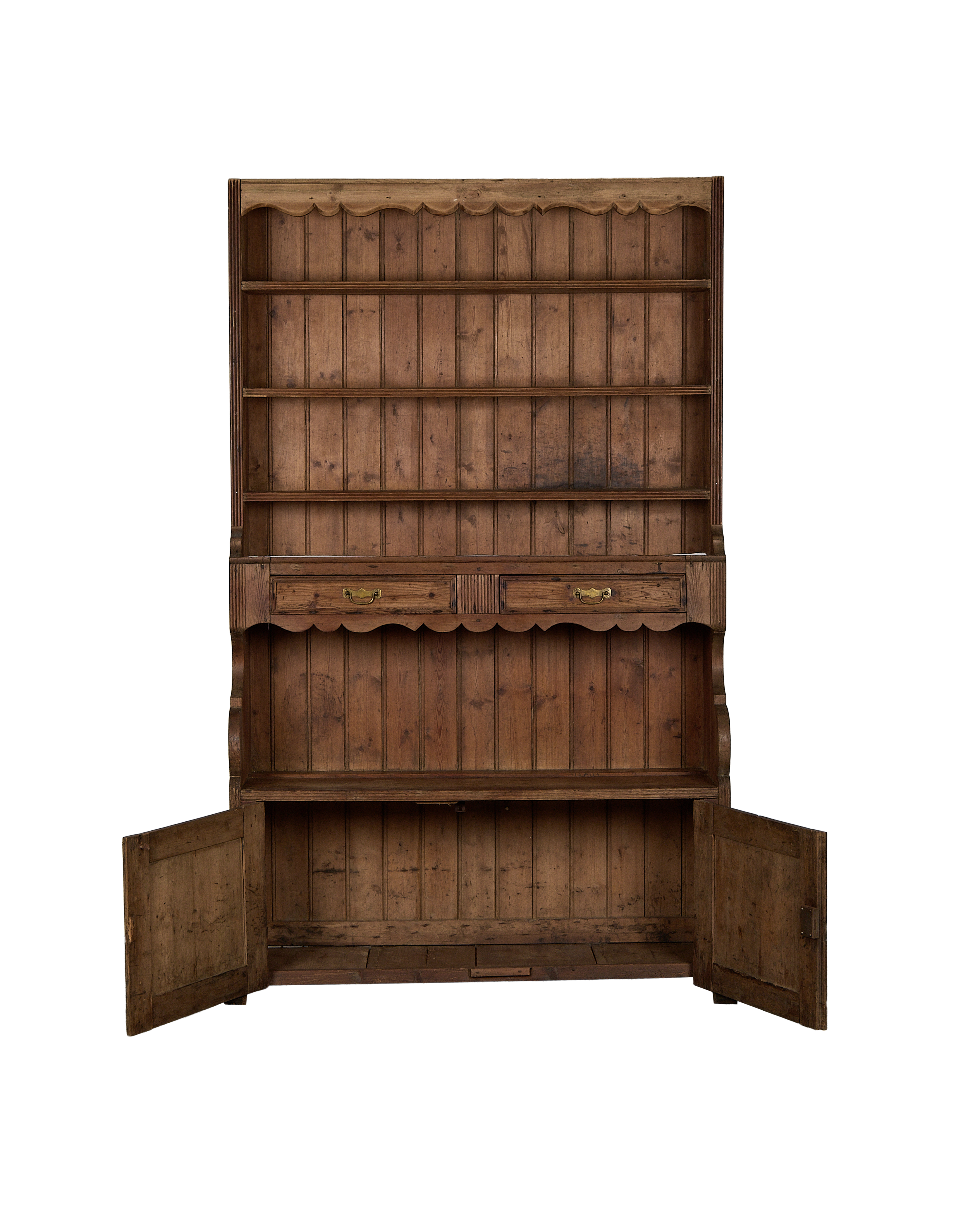 Vintage French oak china cabinet with scalloped top and open lower doors, full view.