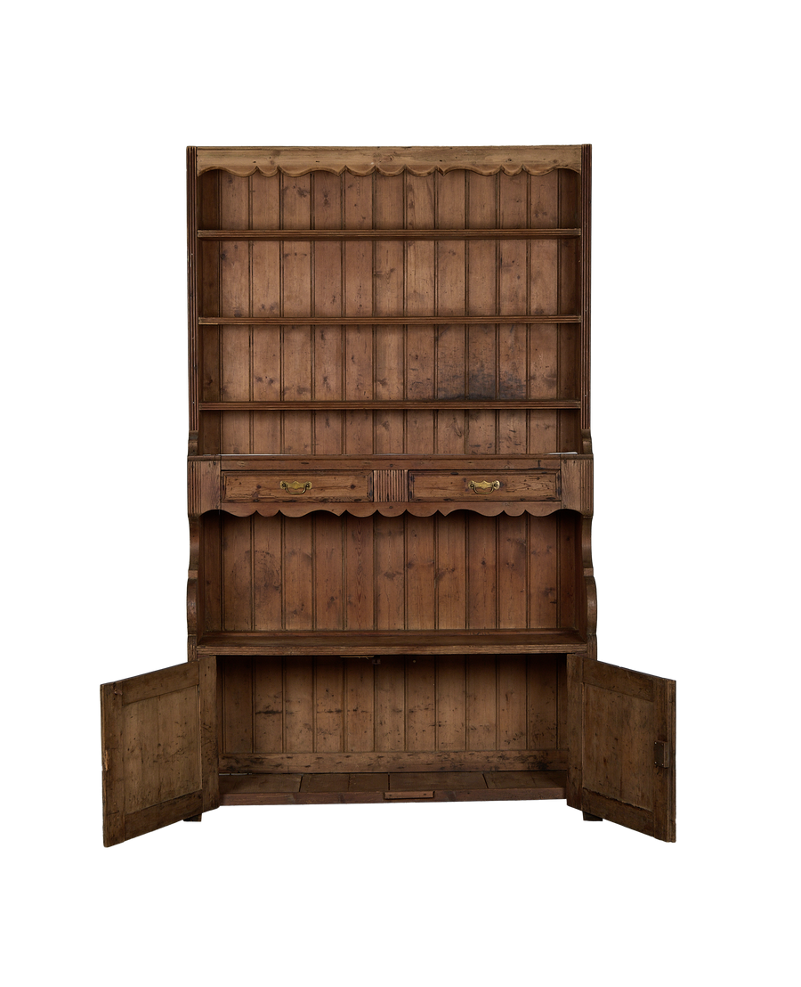 Vintage French oak china cabinet with scalloped top and open lower doors, full view.