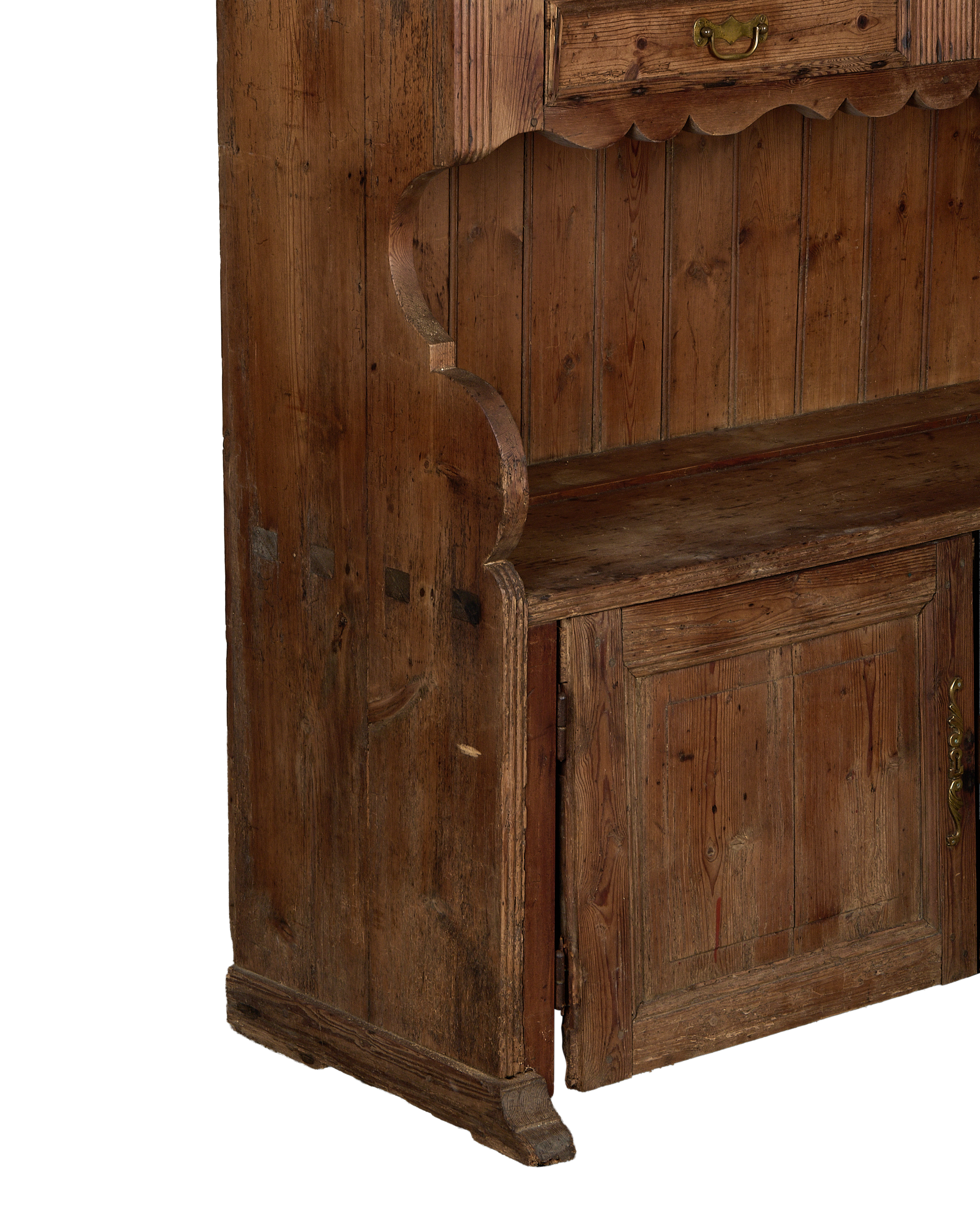 Vintage French oak wood china cabinet, showing lower section with hinged door and decorative trim.