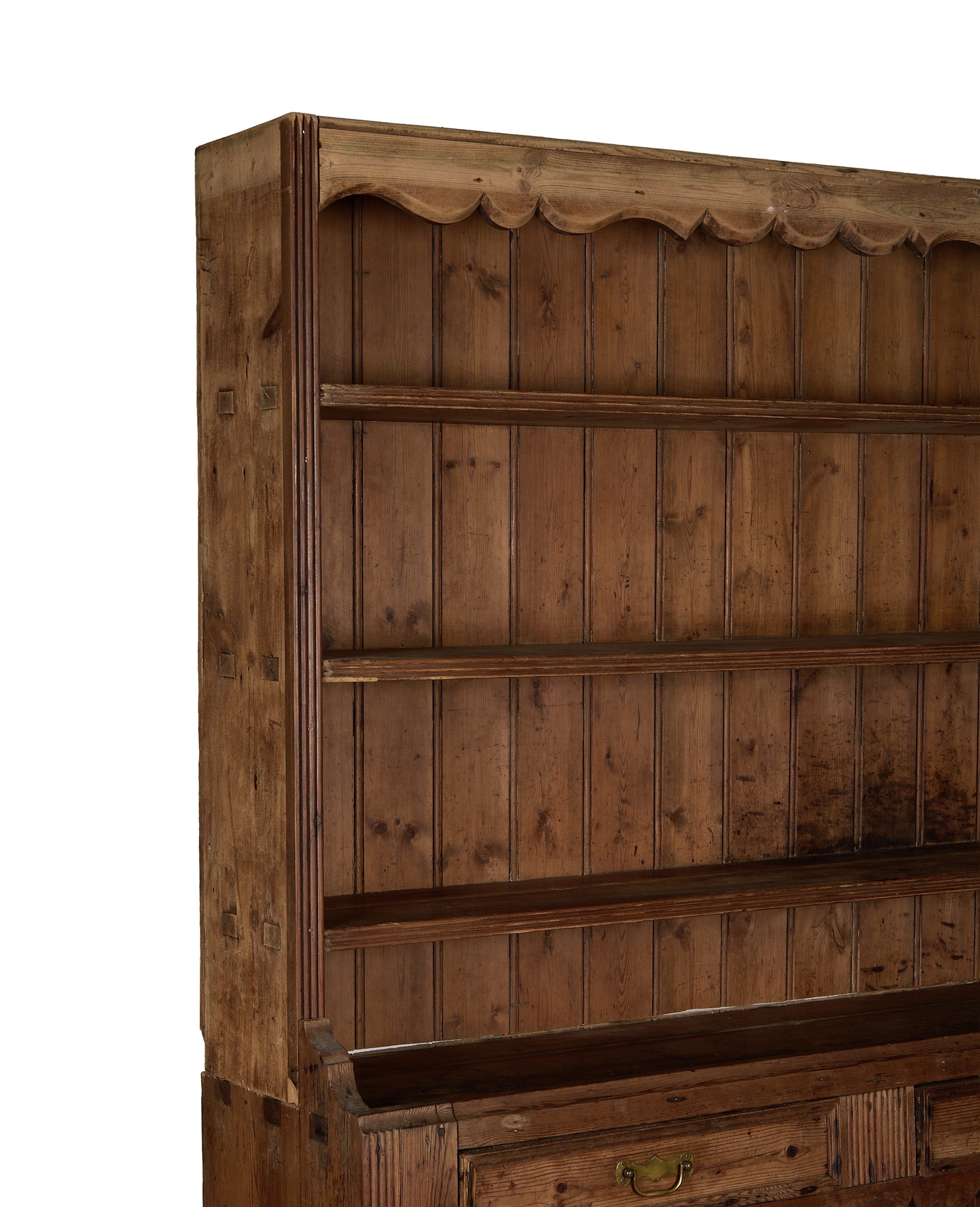 Vintage French oak china cabinet with scalloped top, open shelves, and carved wood details.