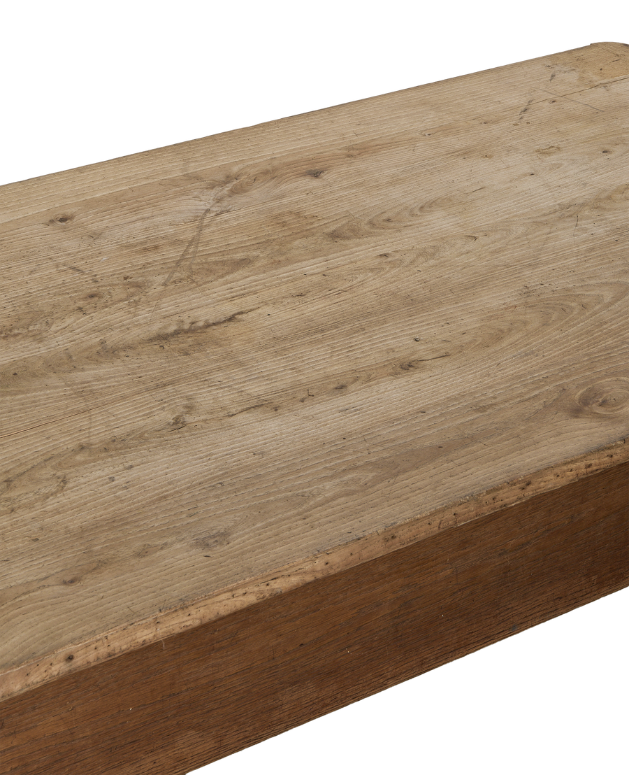 Vintage French draper's oak table, close-up of distressed rustic wood top.