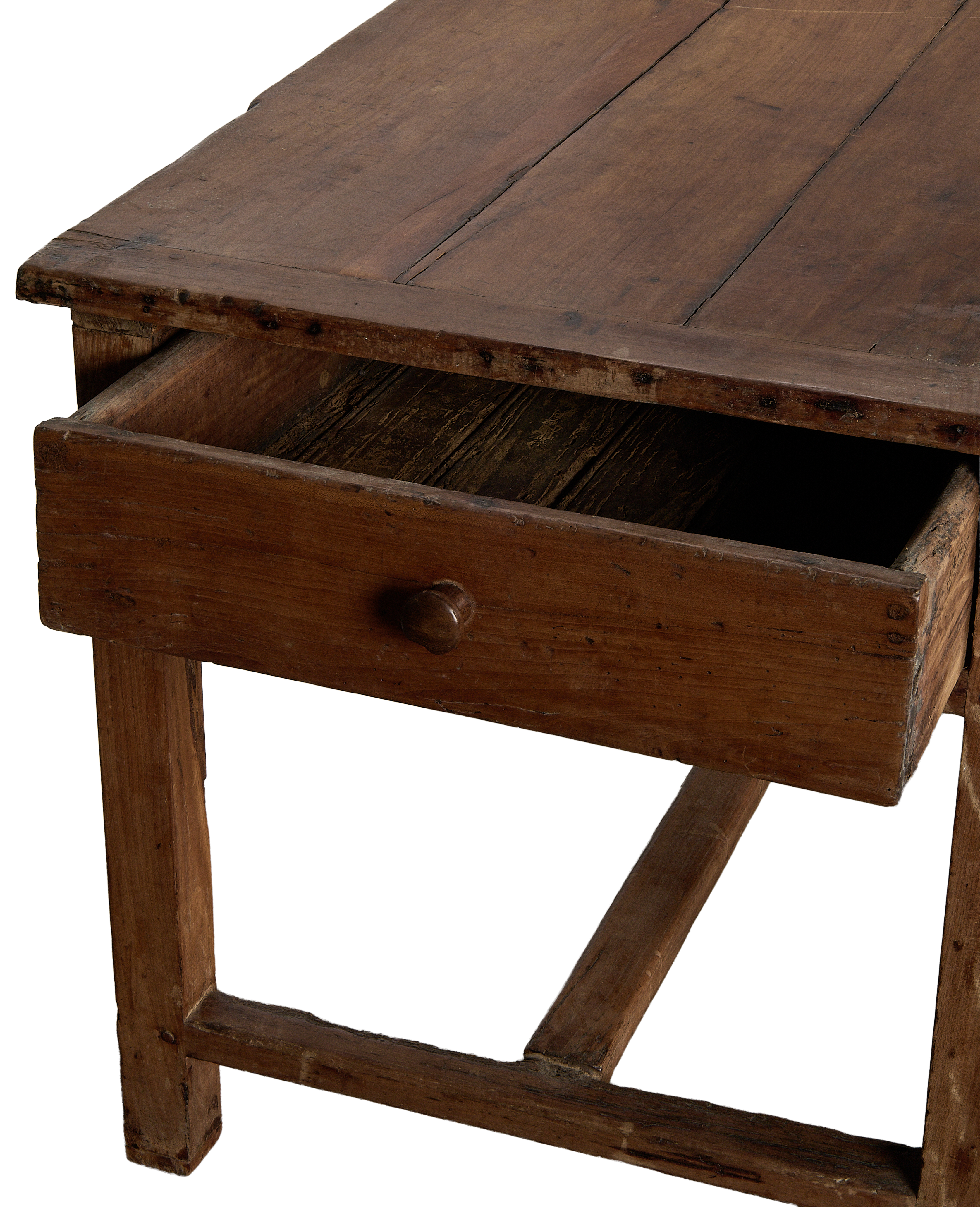 Open drawer of vintage French oak draper's table, showing aged patina.