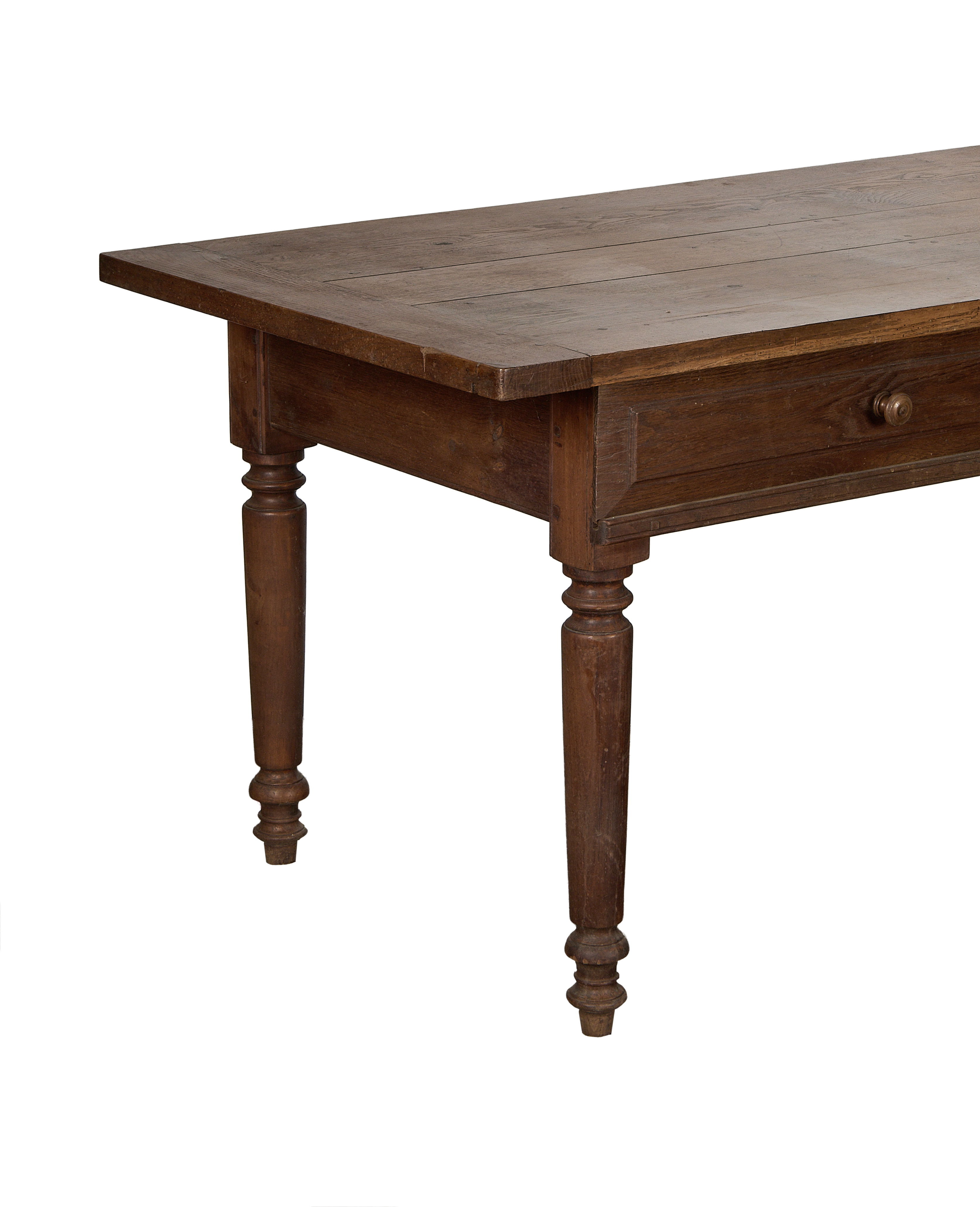 Vintage French oak draper's table, close-up view showing the drawer and turned leg.