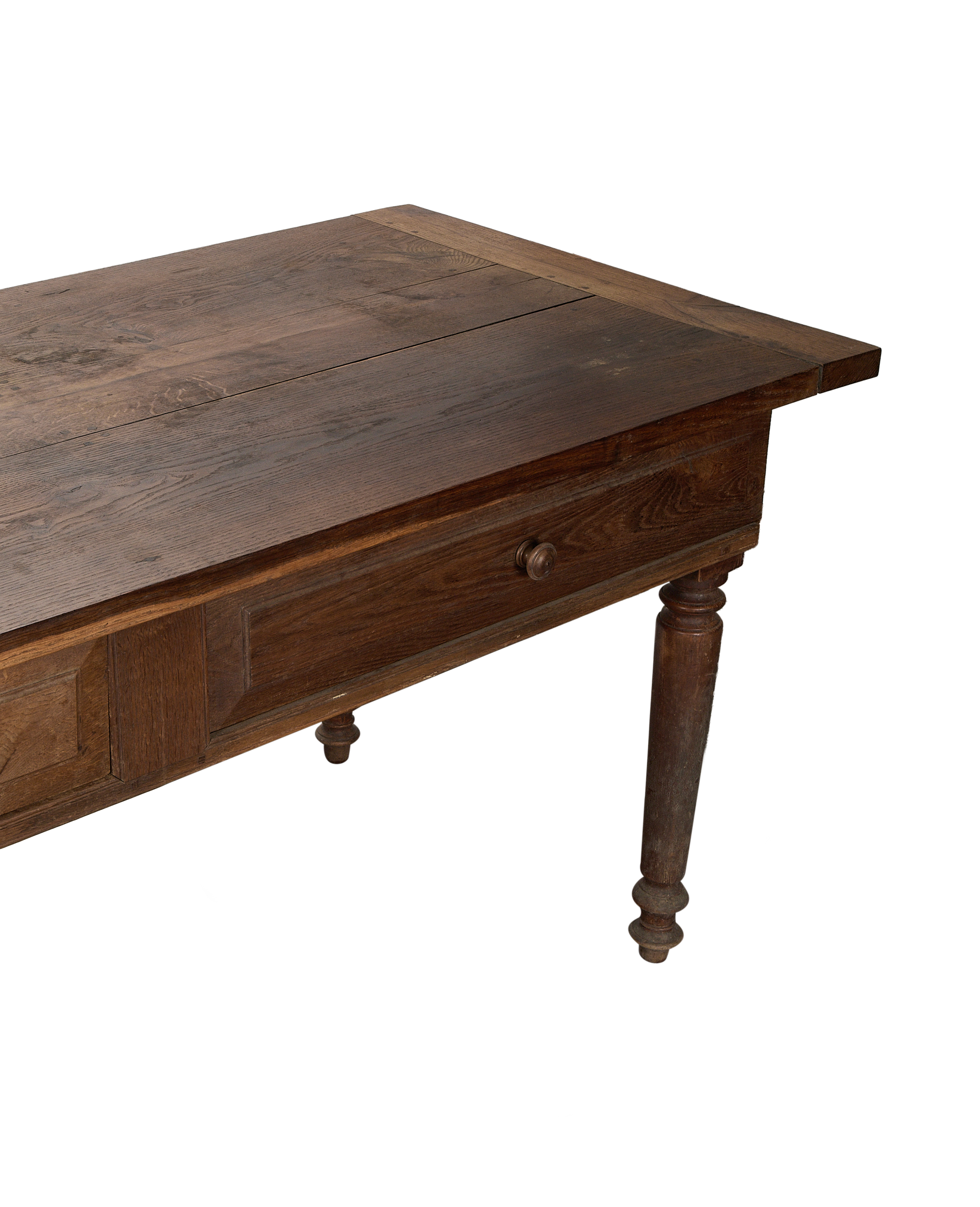 Vintage French oak draper's table, close-up of drawer, antique wooden knob, turned leg.