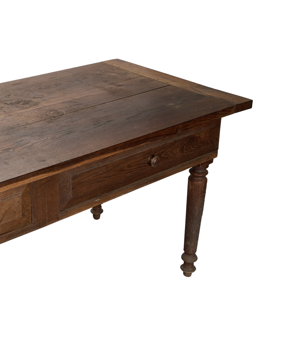Vintage French oak draper's table, close-up of drawer, antique wooden knob, turned leg.