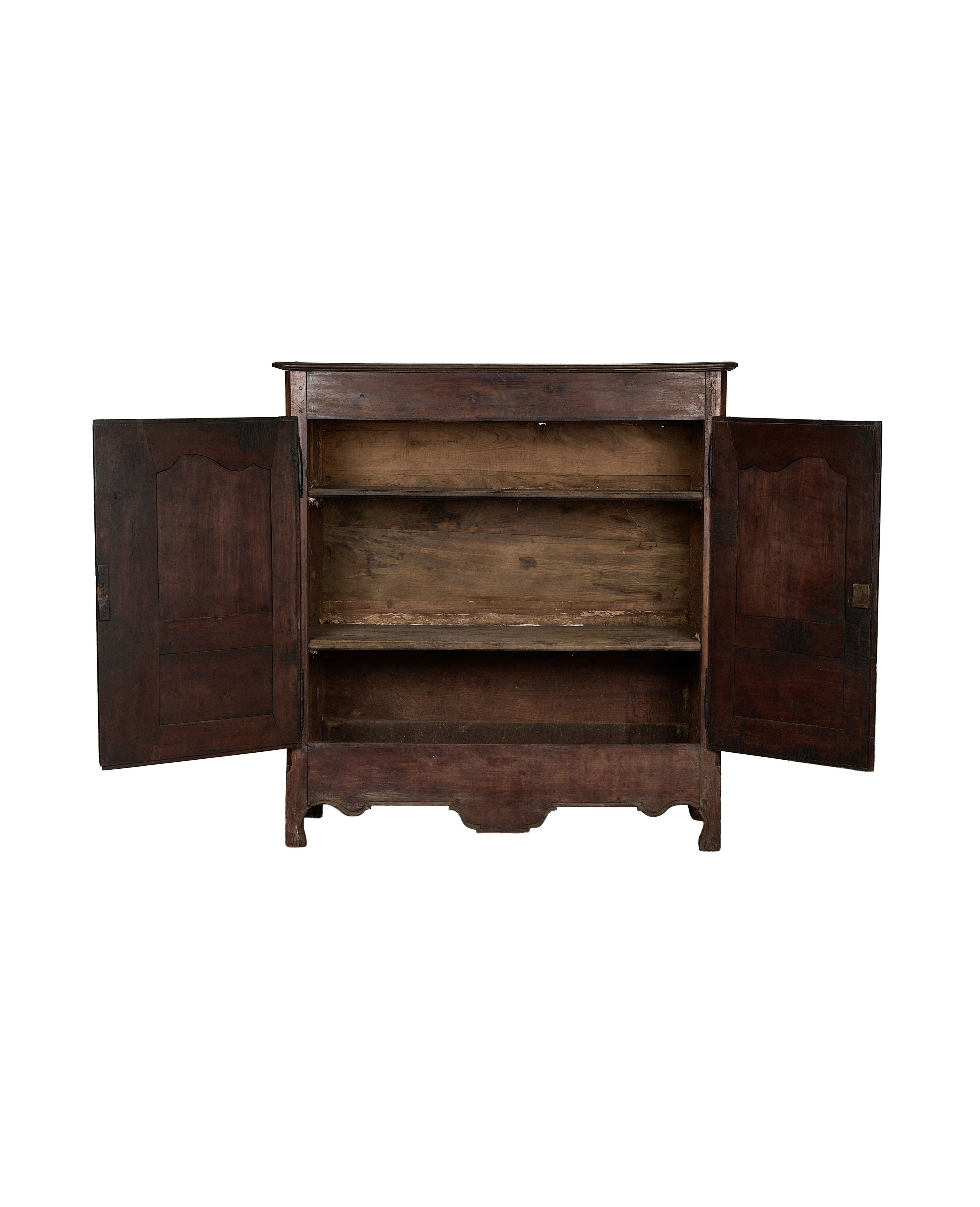 Vintage French oak armoire with doors open, revealing two rustic interior shelves.