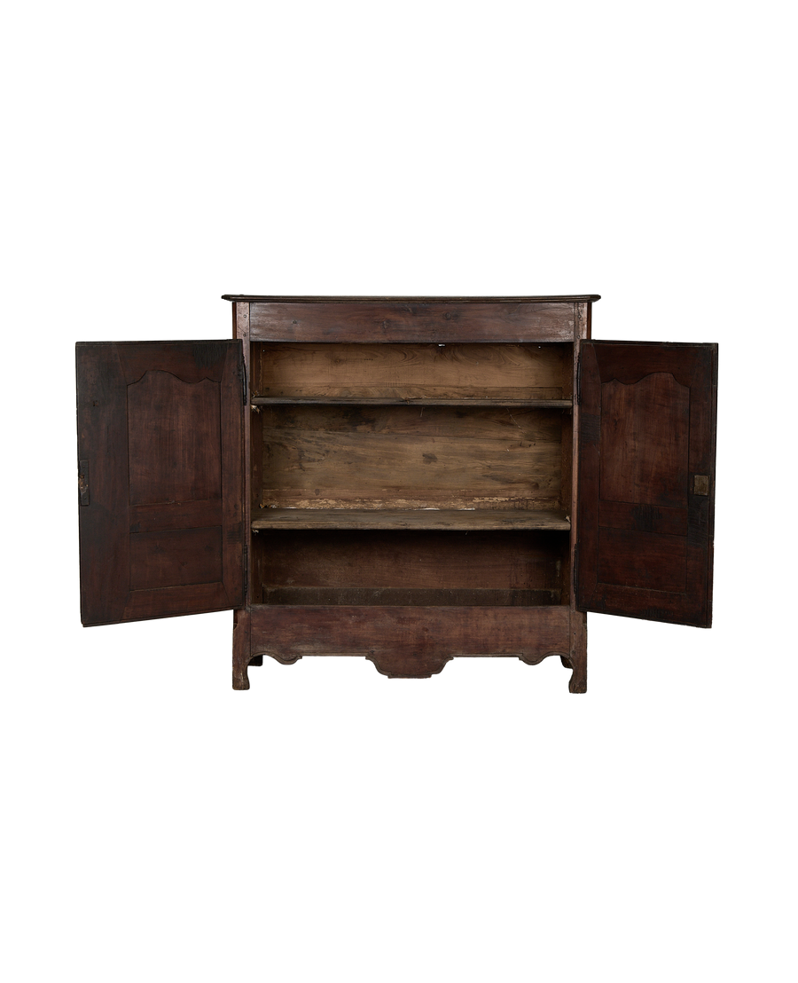 Vintage French oak armoire with doors open, revealing two rustic interior shelves.
